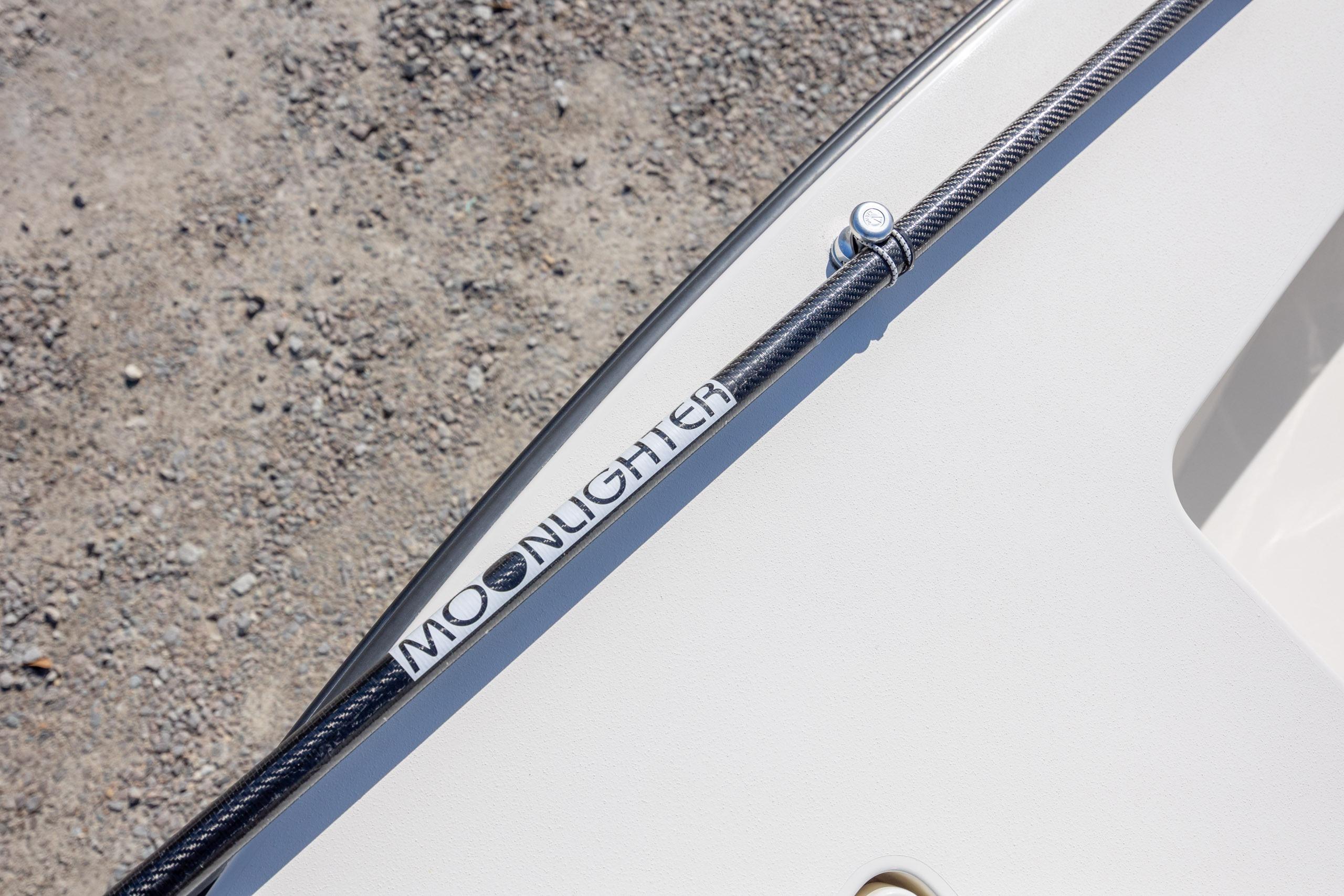 2024 Maverick 17 HPX-S boat detail with "Moonlighter" text on carbon fiber rod.