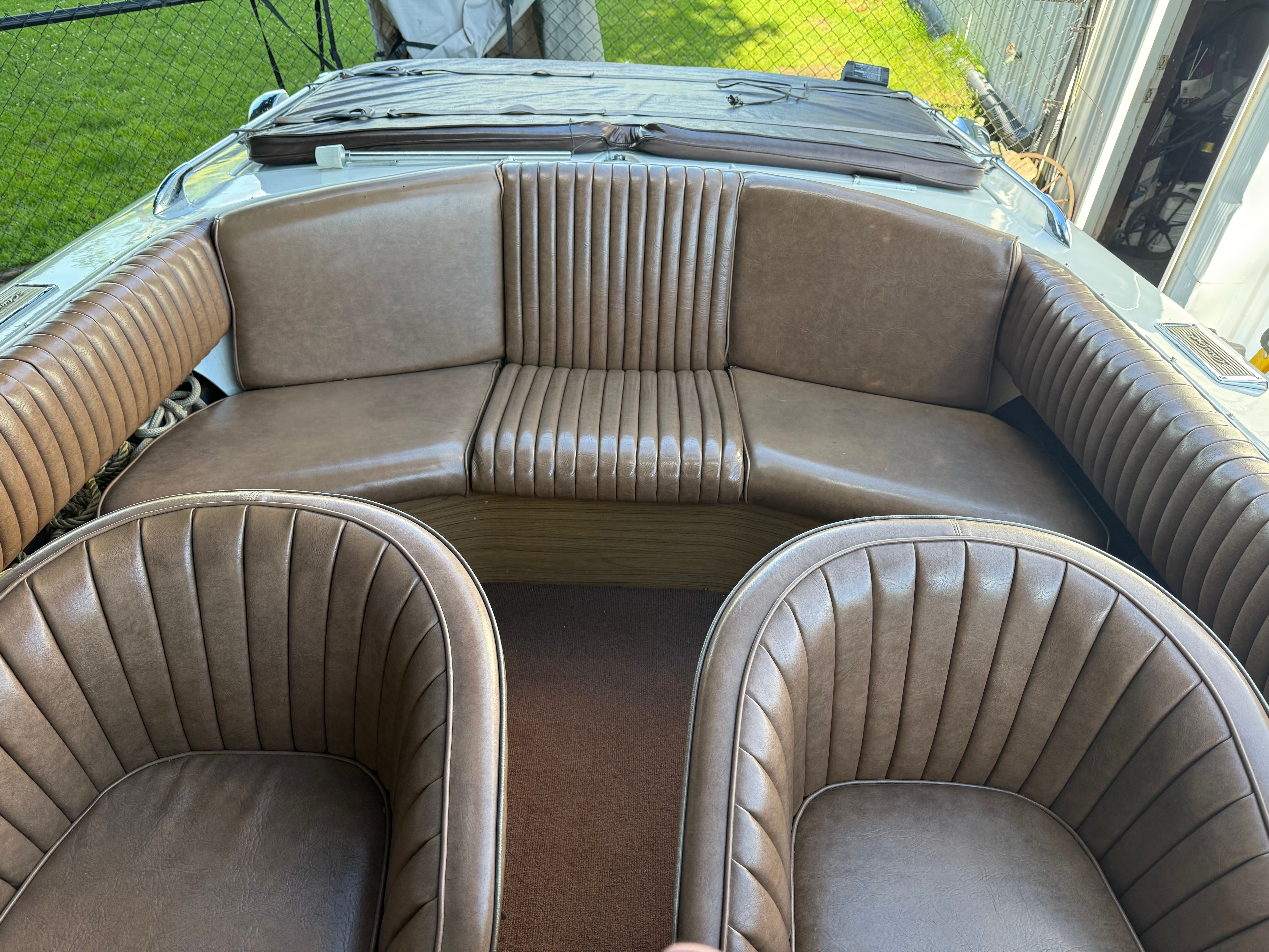 Interior view of a 1972 Chris-Craft XK-19 with brown leather seating.