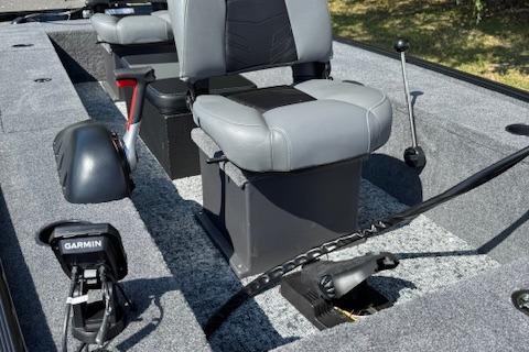 2026 Tracker Panfish 17 boat interior with seating and Garmin equipment.
