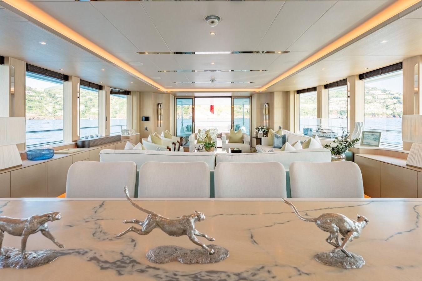 Luxurious interior of 2020 Moonen Martinique YN1 yacht with elegant decor and panoramic windows.