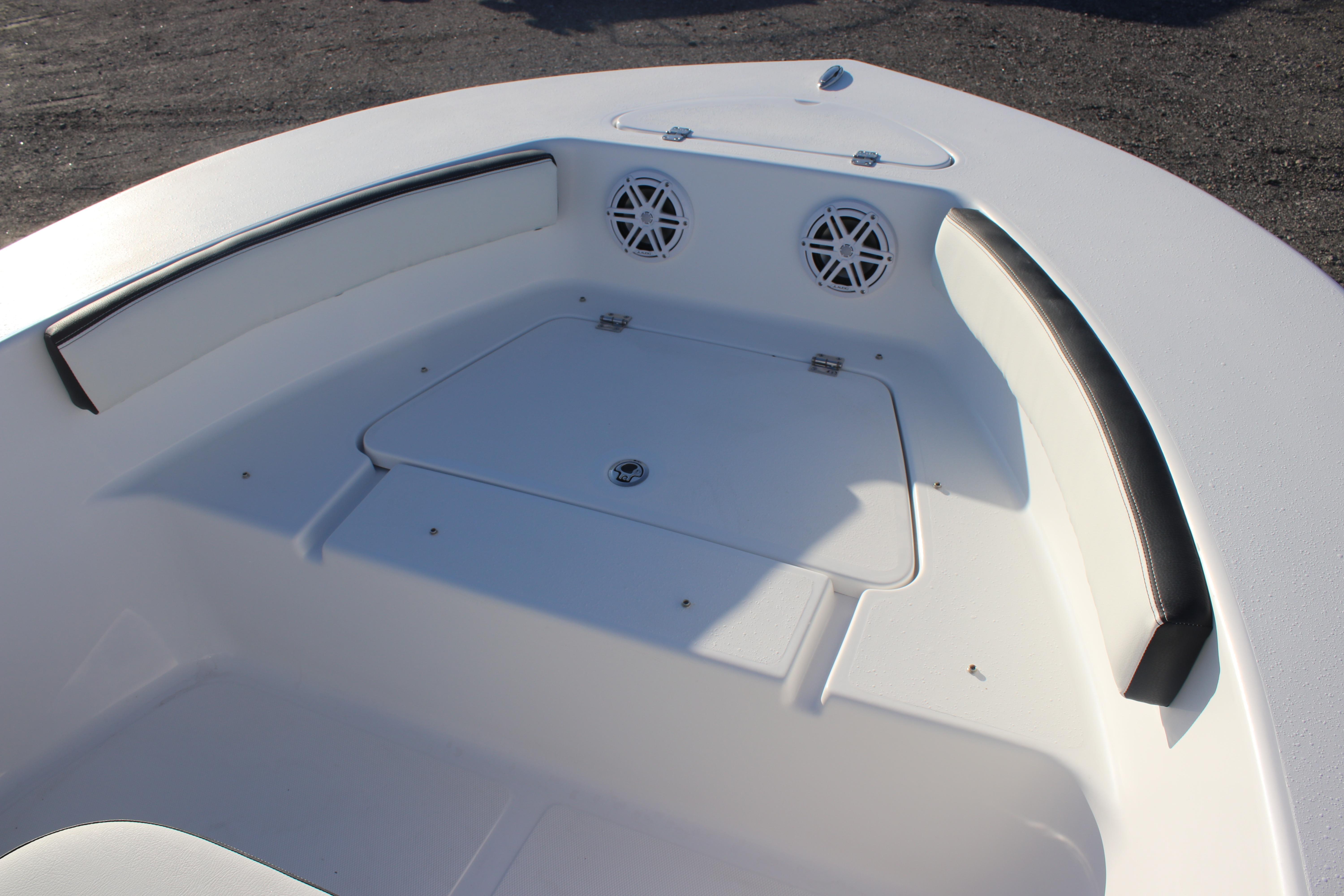 2026 Tidewater 180 CC Adventure boat interior with seating and storage compartments.