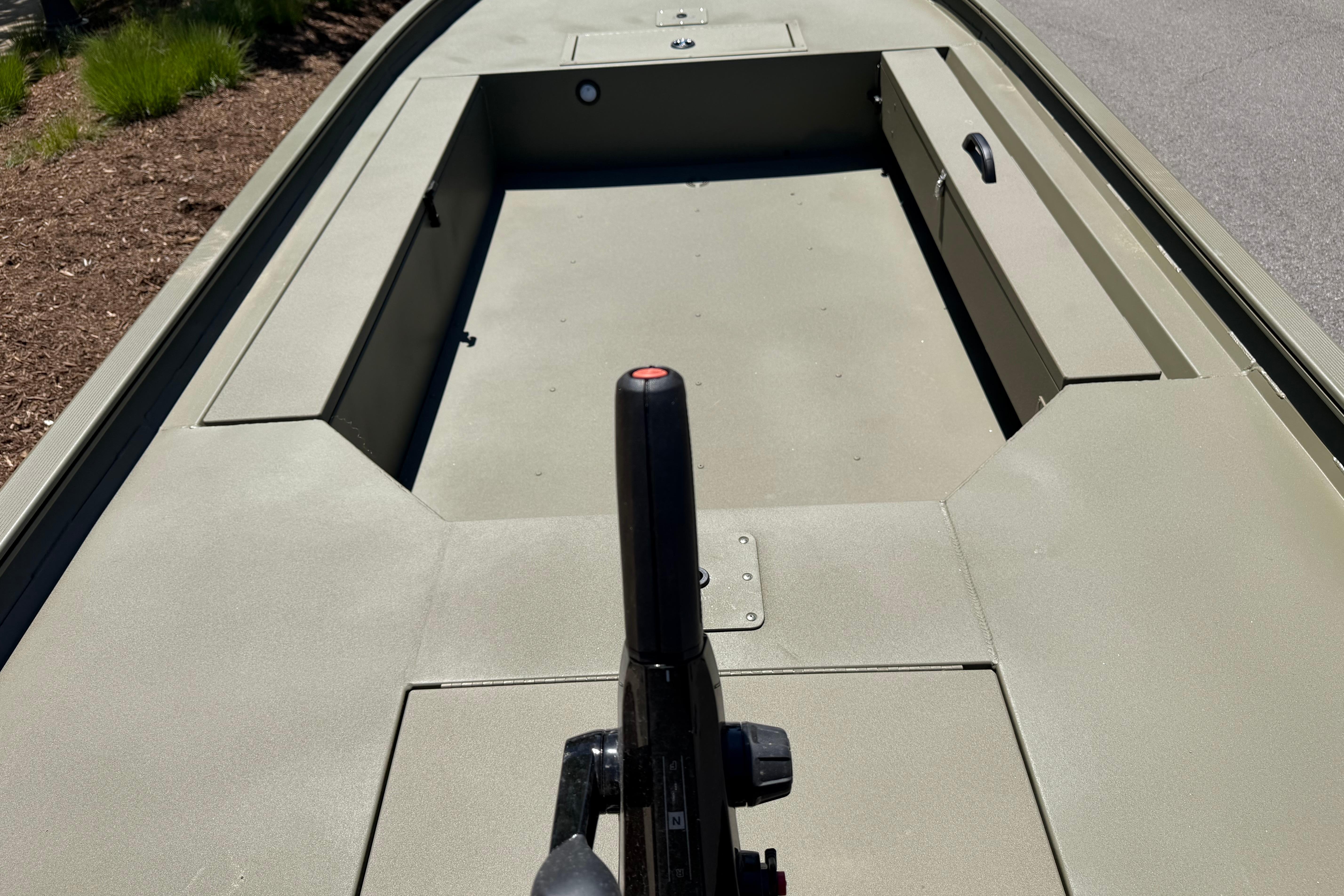 2026 Tracker Grizzly 1654 T Sportsman boat interior with steering control.