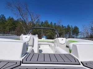 The image shows the deck of a 2023 Starcraft SVX 191 OB boat with gray upholstery.