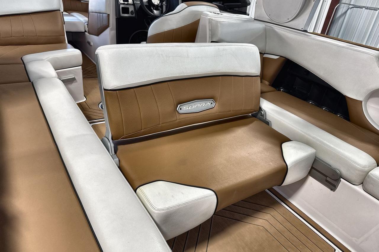 2020 Supra SE interior with luxurious brown and white leather seating.