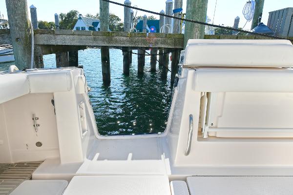 2008 Tiara Yachts 4200 Open, docked, showcasing rear deck and water view.
