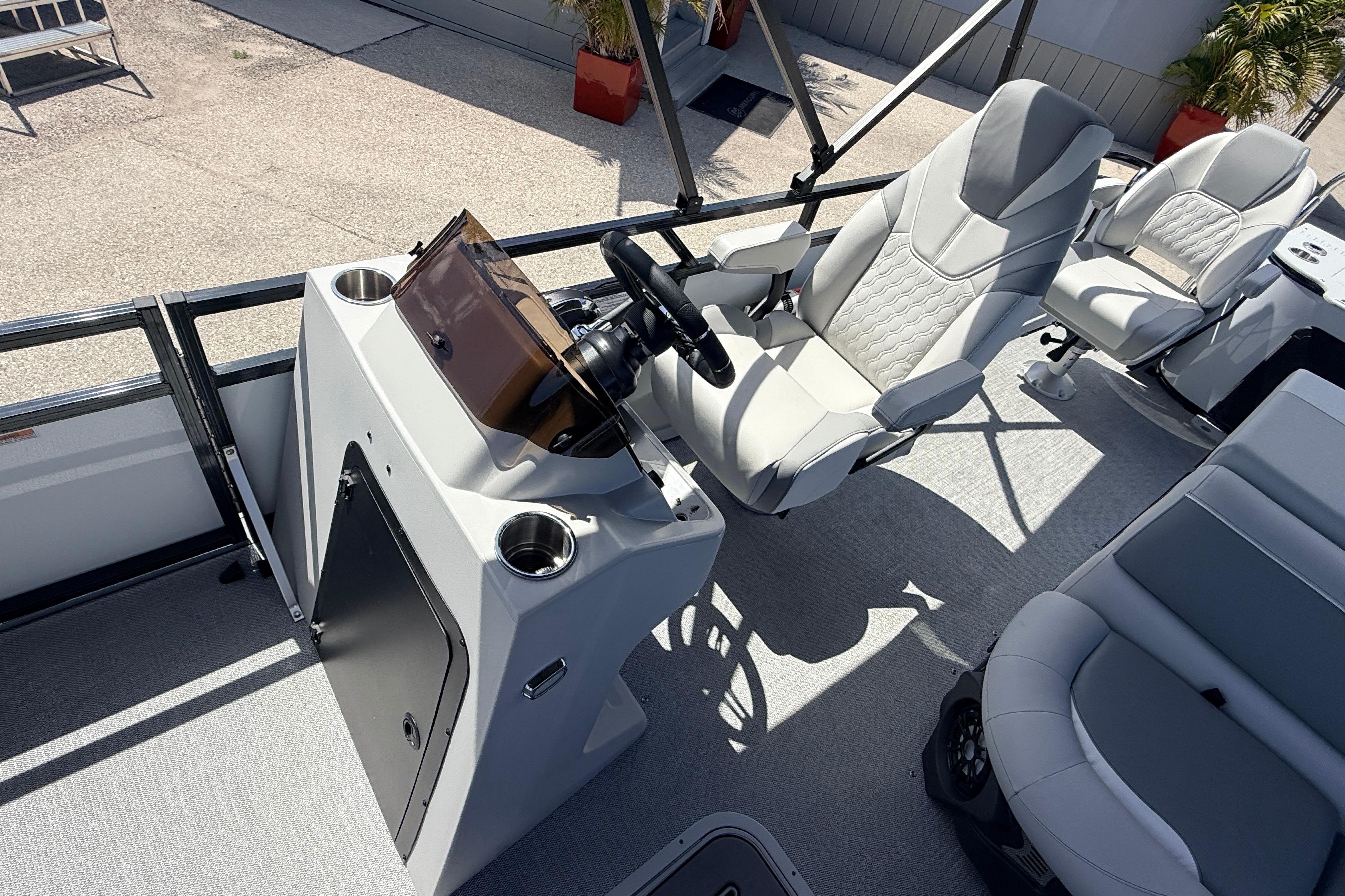 2026 Avalon 2385 Venture 85 Tri Toon boat interior with modern helm and seating.