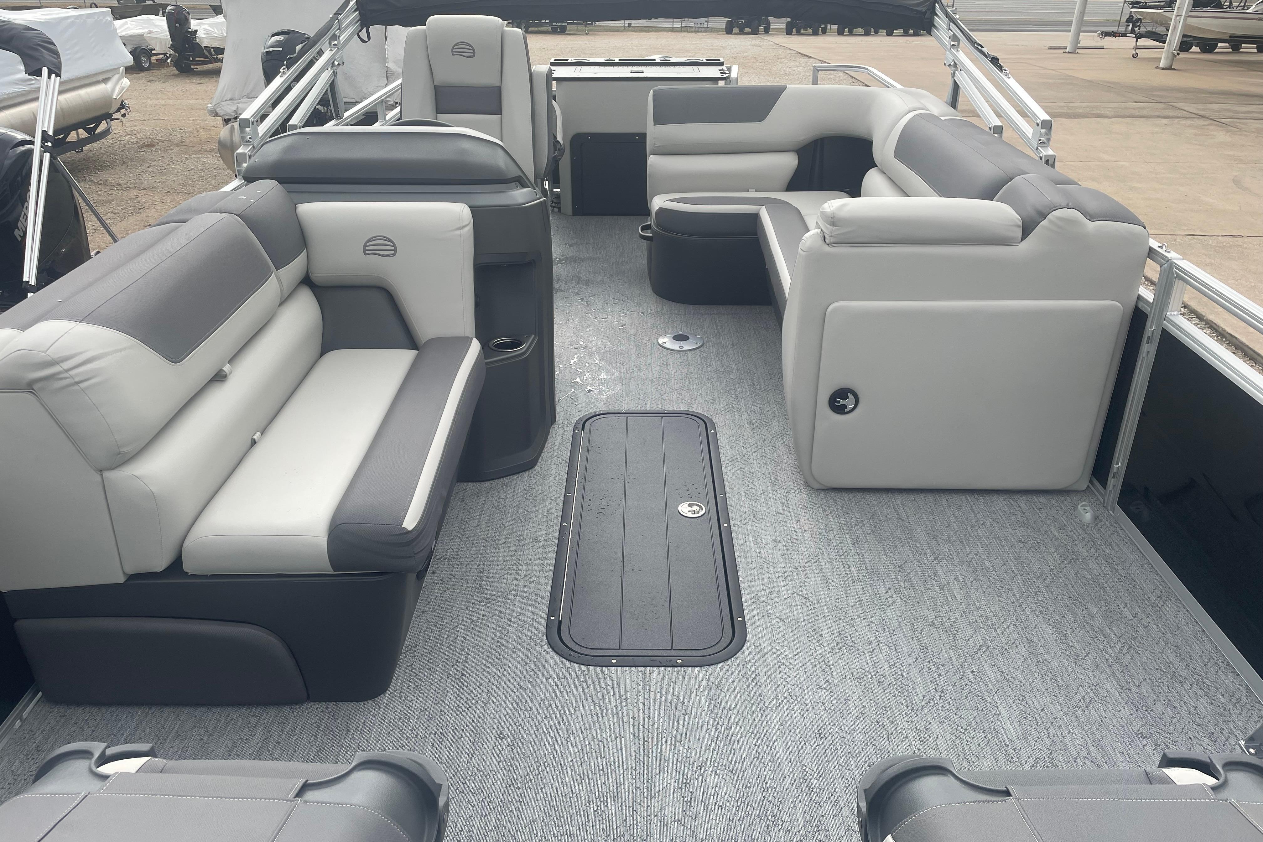 2026 Sun Tracker Fishin' Barge 22 XP3 interior with spacious seating and modern design.