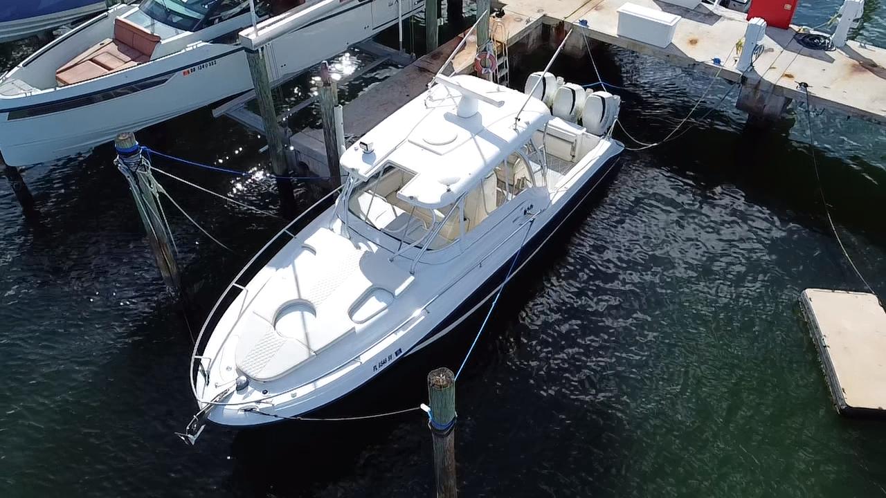 2006 Hydra-Sports Vector 3300 VX boat docked at marina, aerial view.