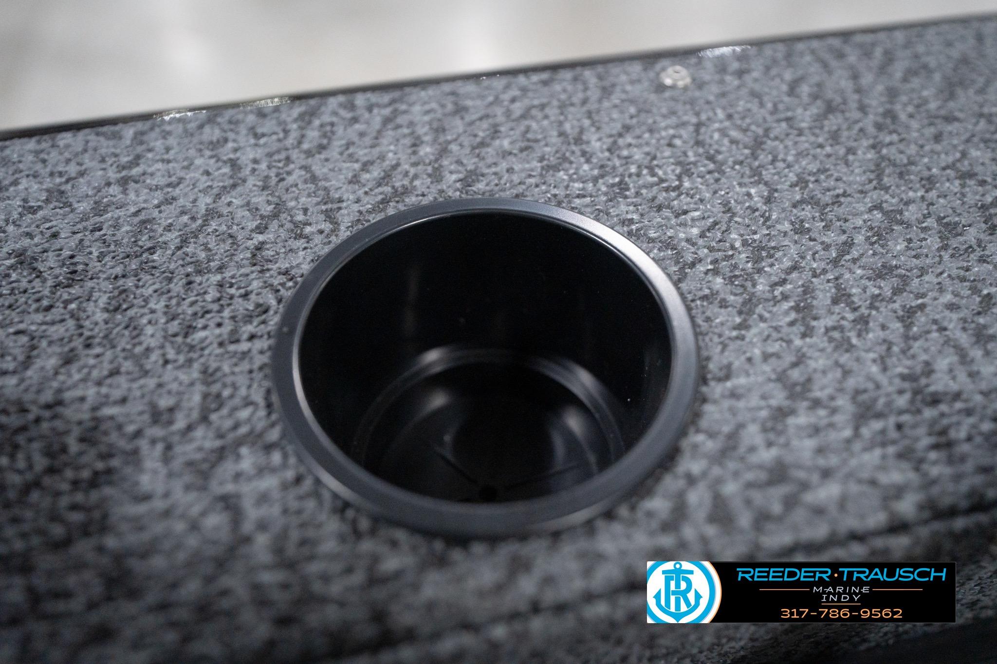 Cup holder on 2026 Lund 1800 Explorer Sport boat with textured surface.