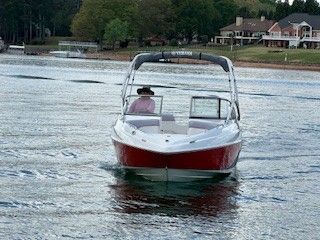 2008 Yamaha AR230 boat on a calm lake.