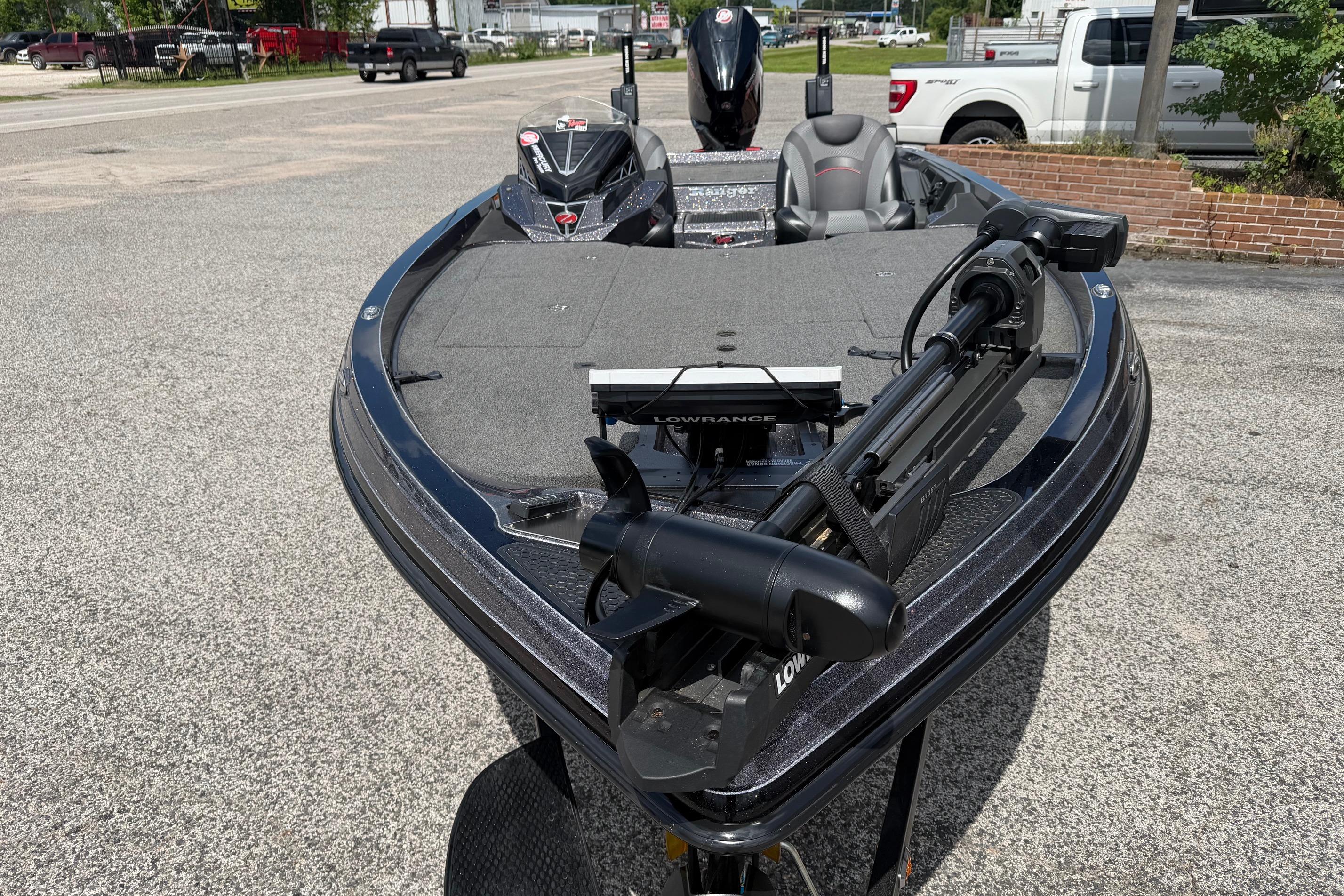 2020 Ranger Z520L bass boat with trolling motor and electronics, parked outdoors.