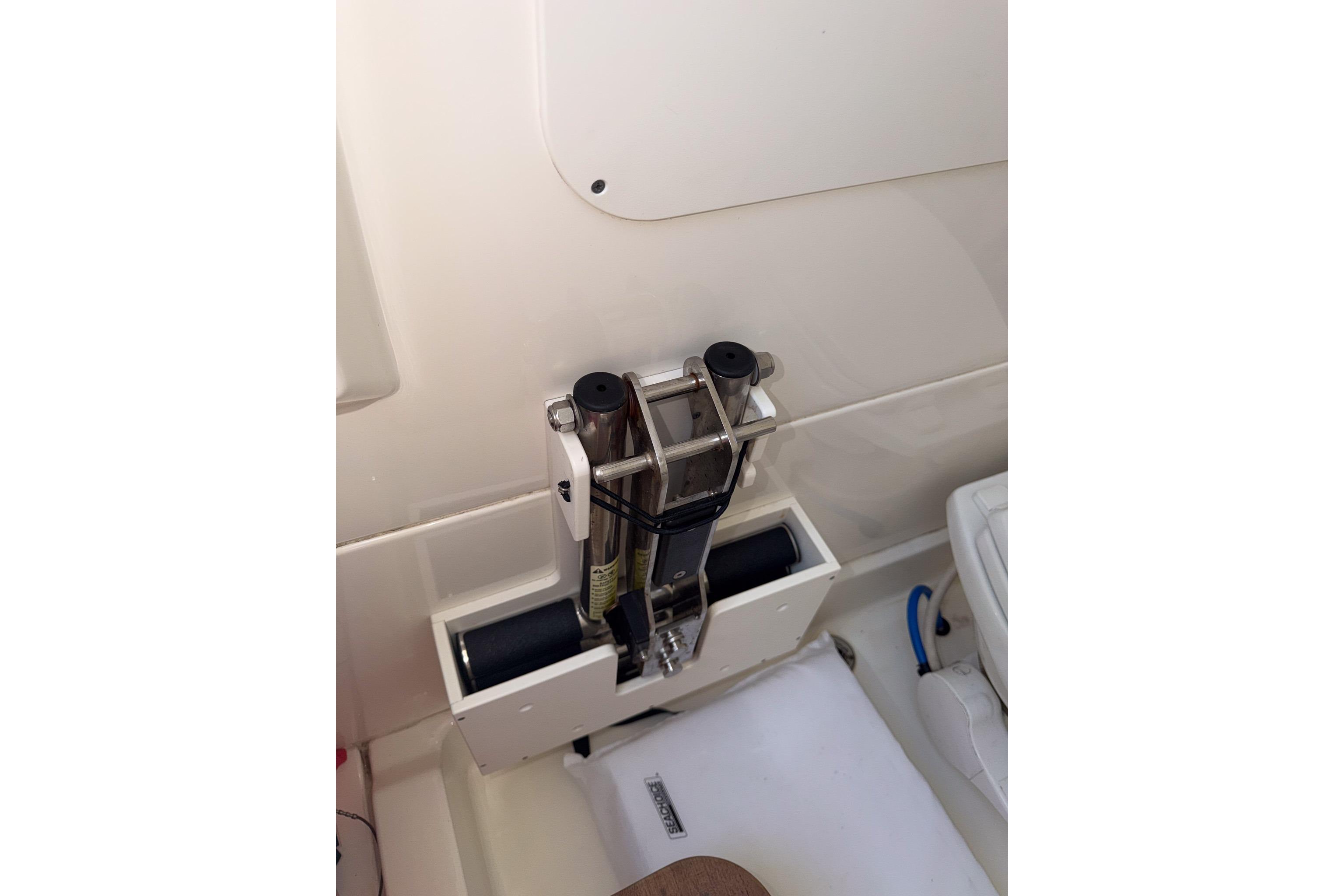 Boston Whaler 330 Outrage 2021 boat interior detail with mounted fishing rod holder.