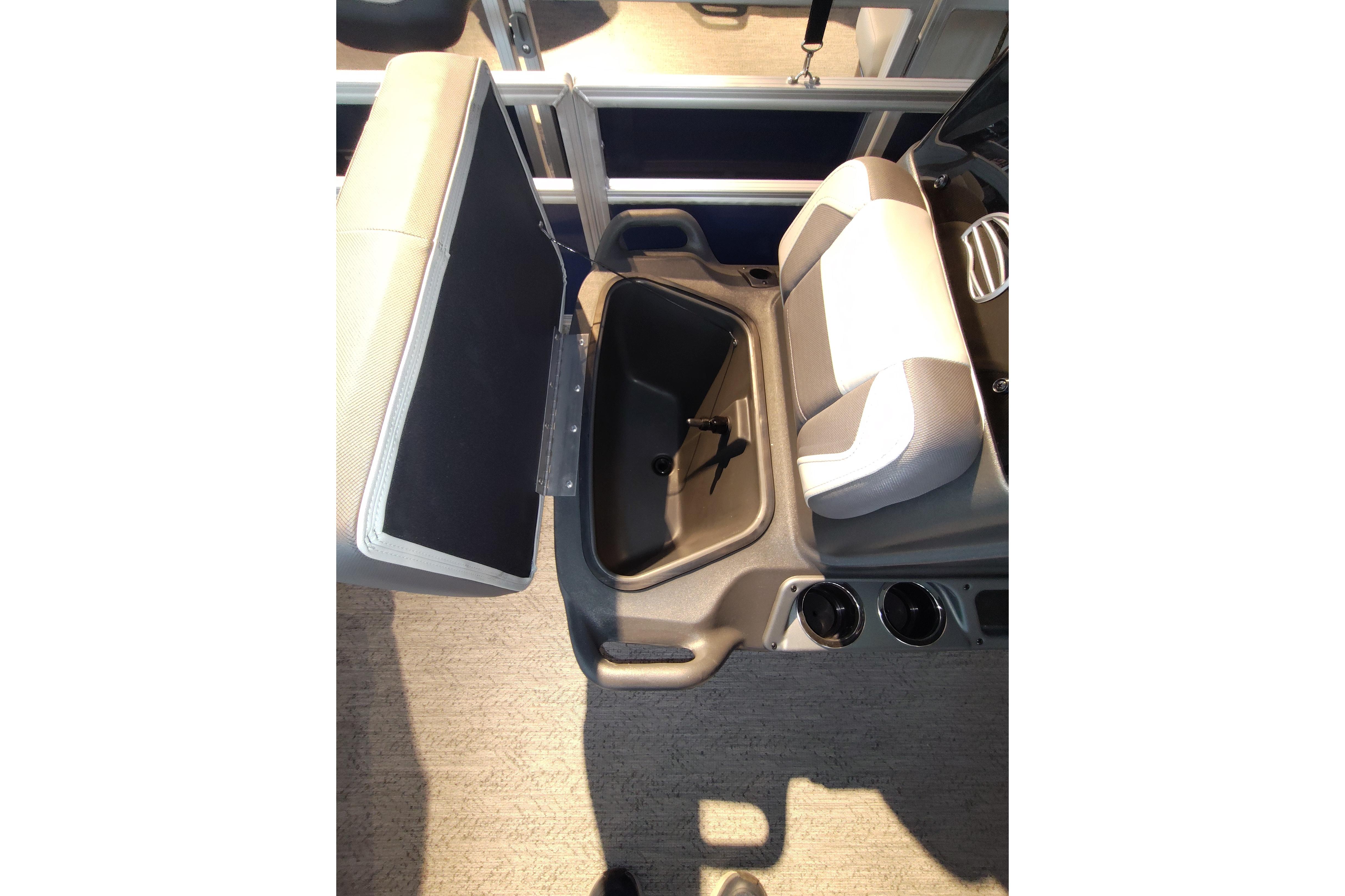 2026 Sun Tracker Bass Buggy 18 DLX seat with storage compartment open.