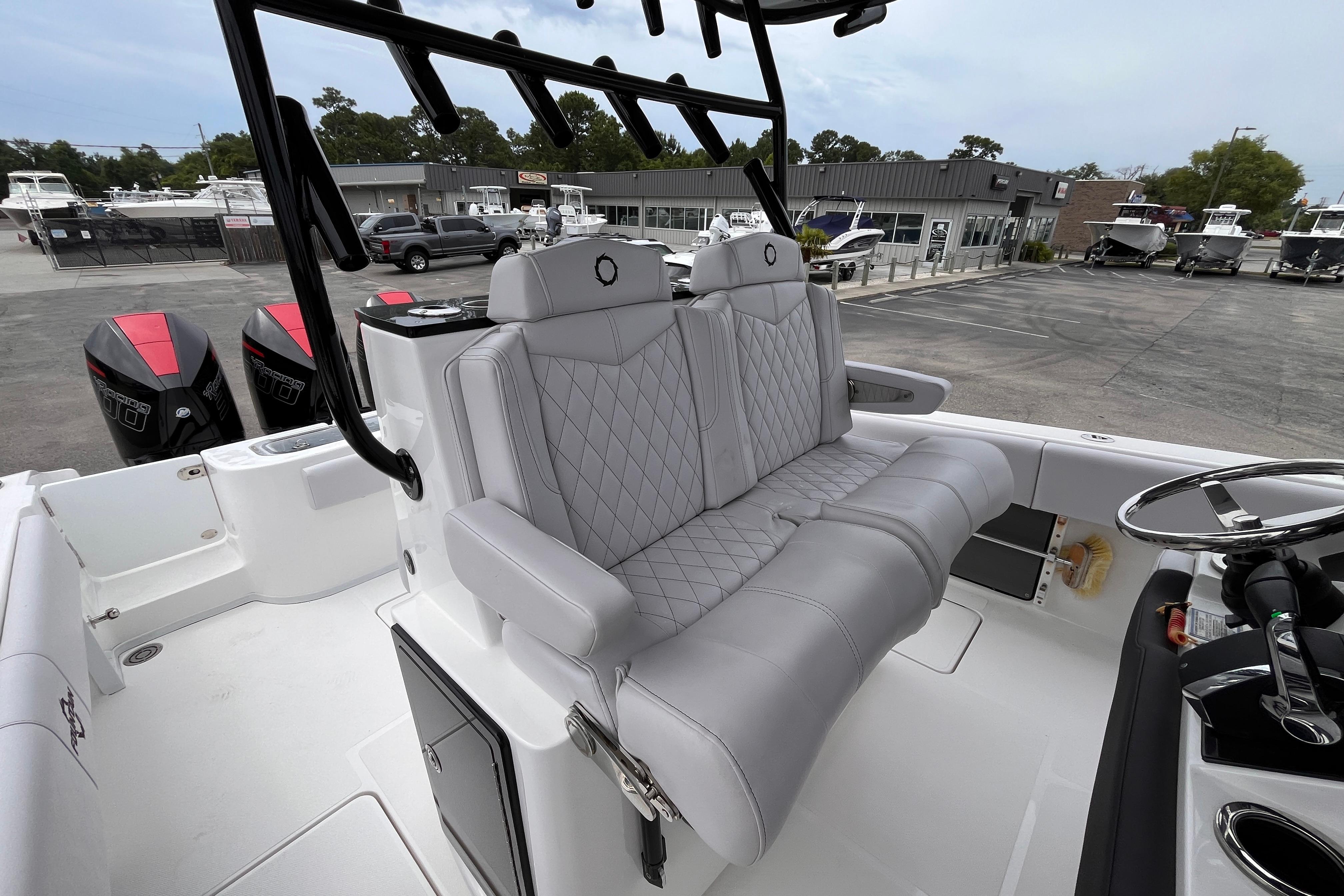 2024 Fountain 34 Tournament Edition boat with luxurious seating and dual outboard engines.