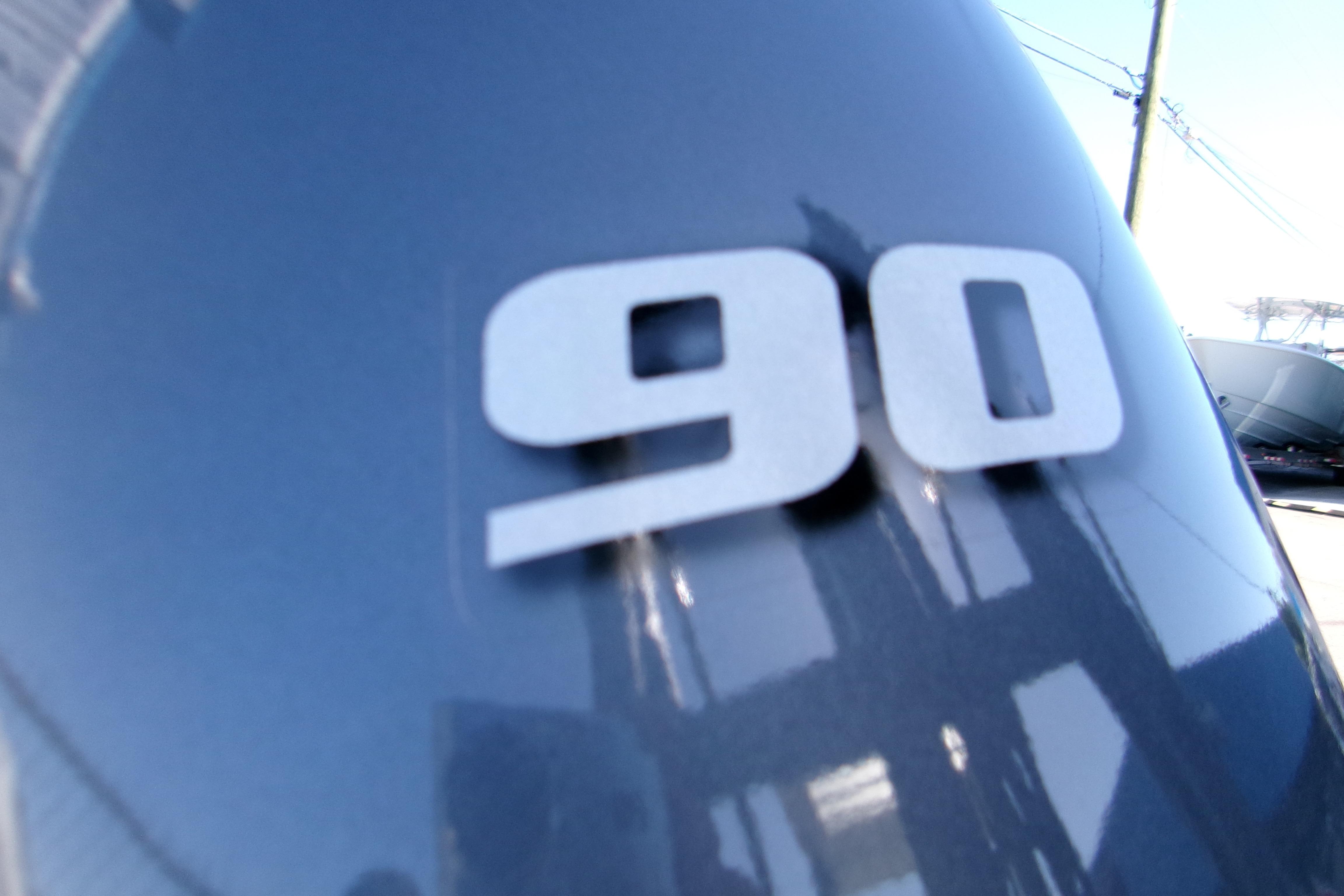 Close-up of '90' on 2026 Key West 1720 Center Console boat engine.