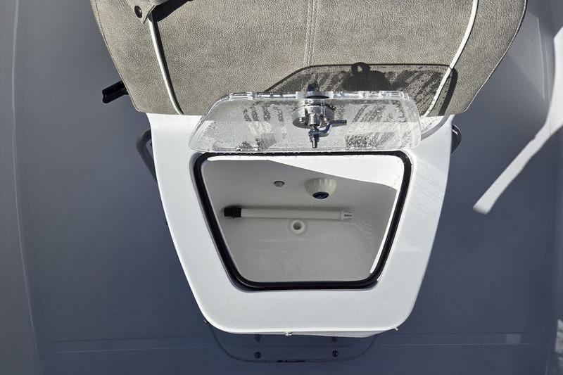 2026 Sea Hunt Ultra 275 Coffin Box interior view with open storage compartment.