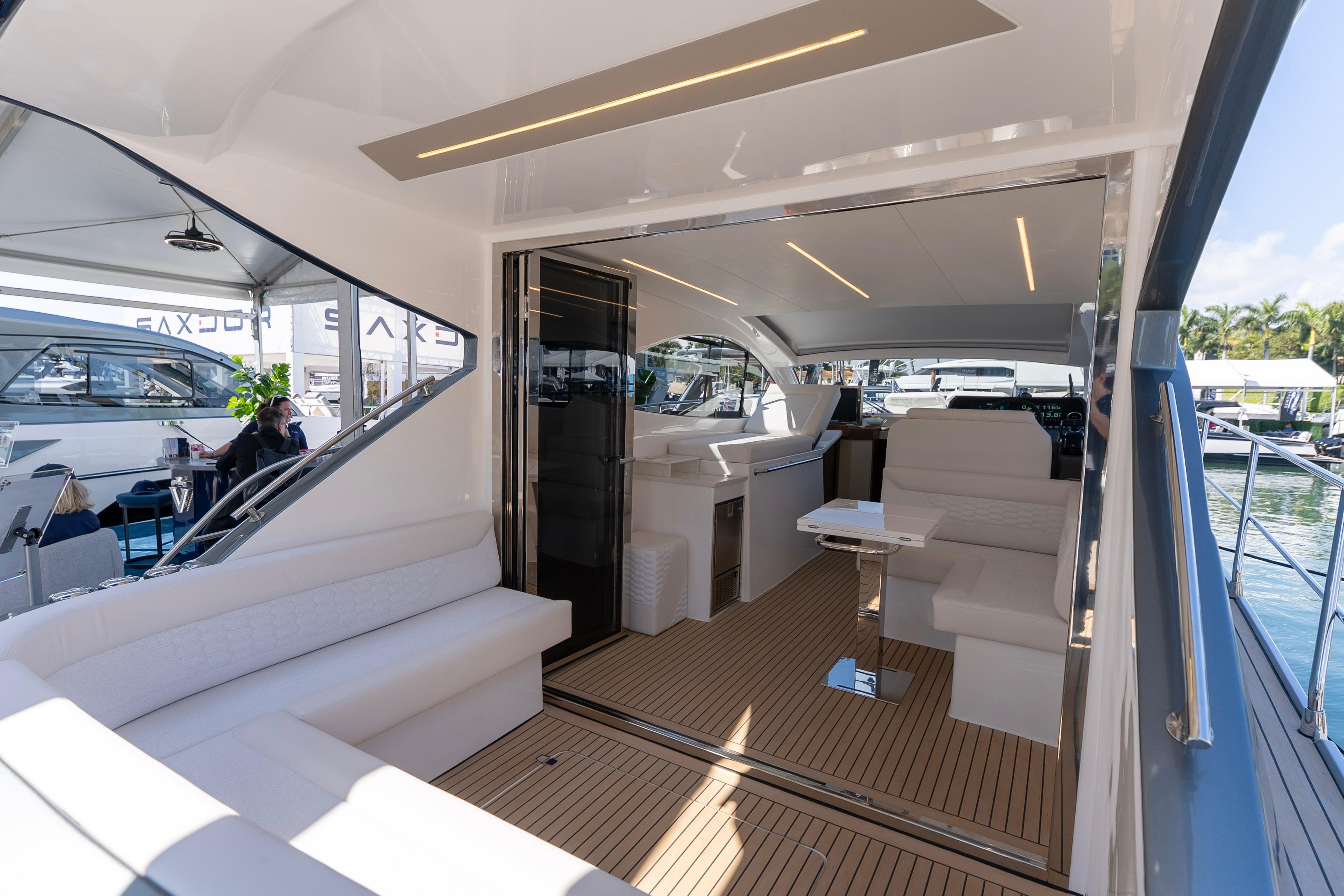 Luxurious interior of 2026 Valiatt 410HT yacht with modern seating and sleek design.