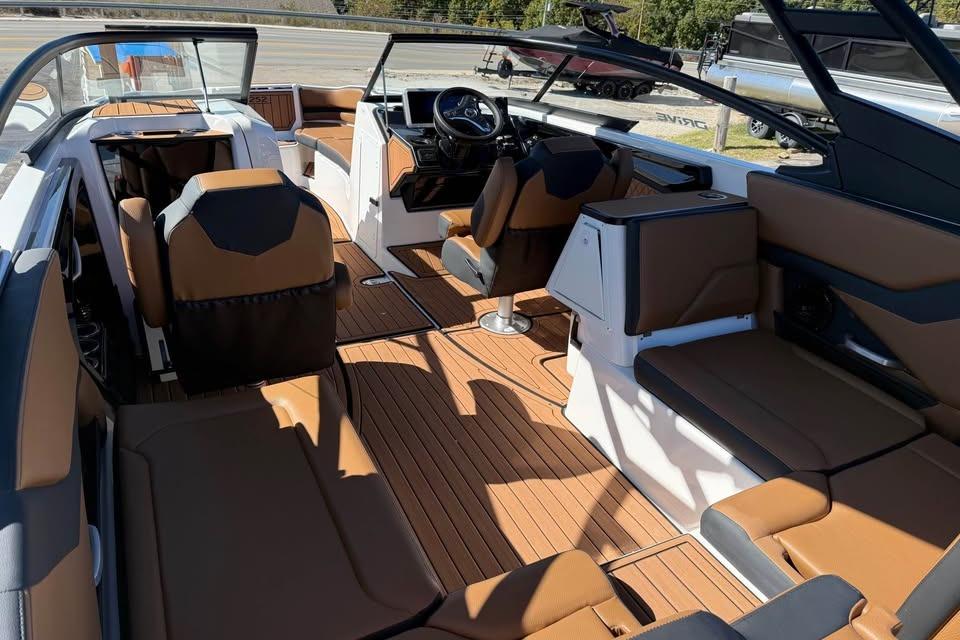 2026 Yamaha Boats 252SD interior with luxurious seating and modern dashboard design.