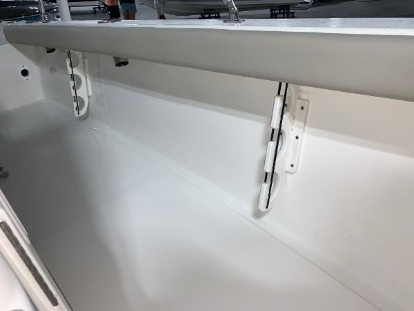 2026 Key West 188 Bay Reef boat interior, showcasing sleek white design and storage features.
