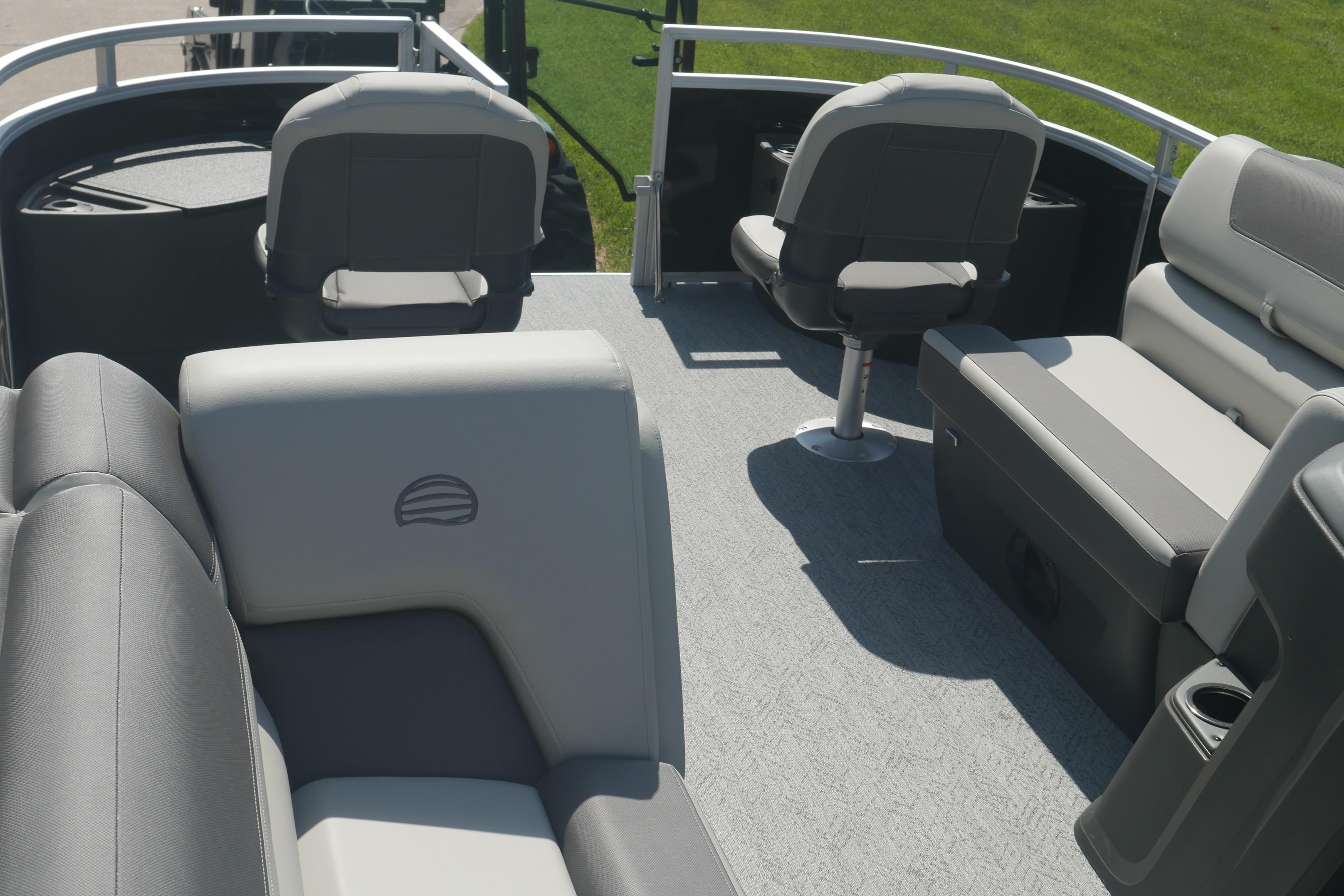 2026 Sun Tracker Fishin' Barge 20 DLX interior with comfortable seating and modern design.
