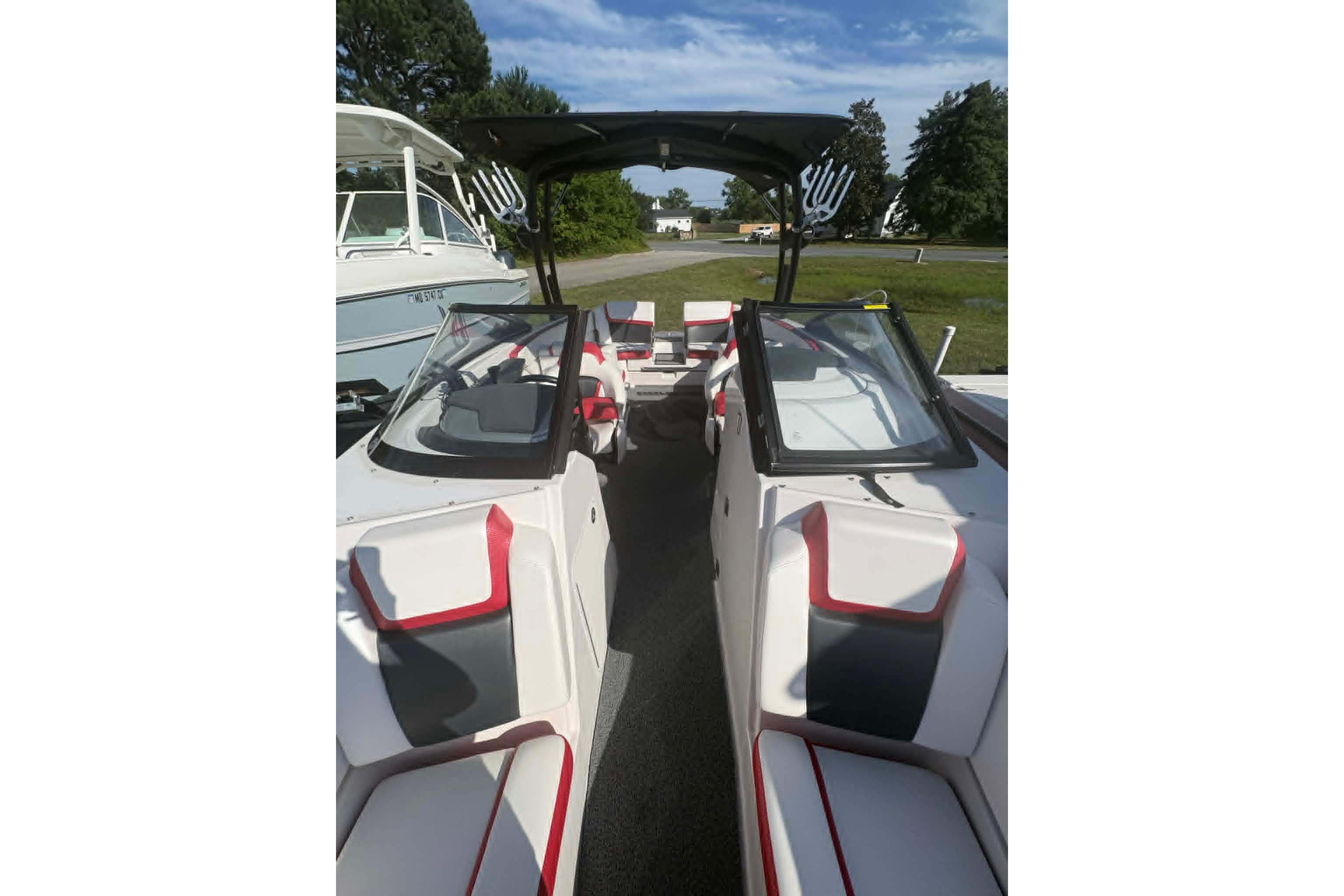2016 Scarab 255 H.O. Impulse boat with sleek interior and modern design.