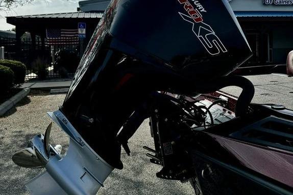 2026 Ranger Z518 Cup-Equipped boat with Mercury Pro XS engine, parked outdoors.