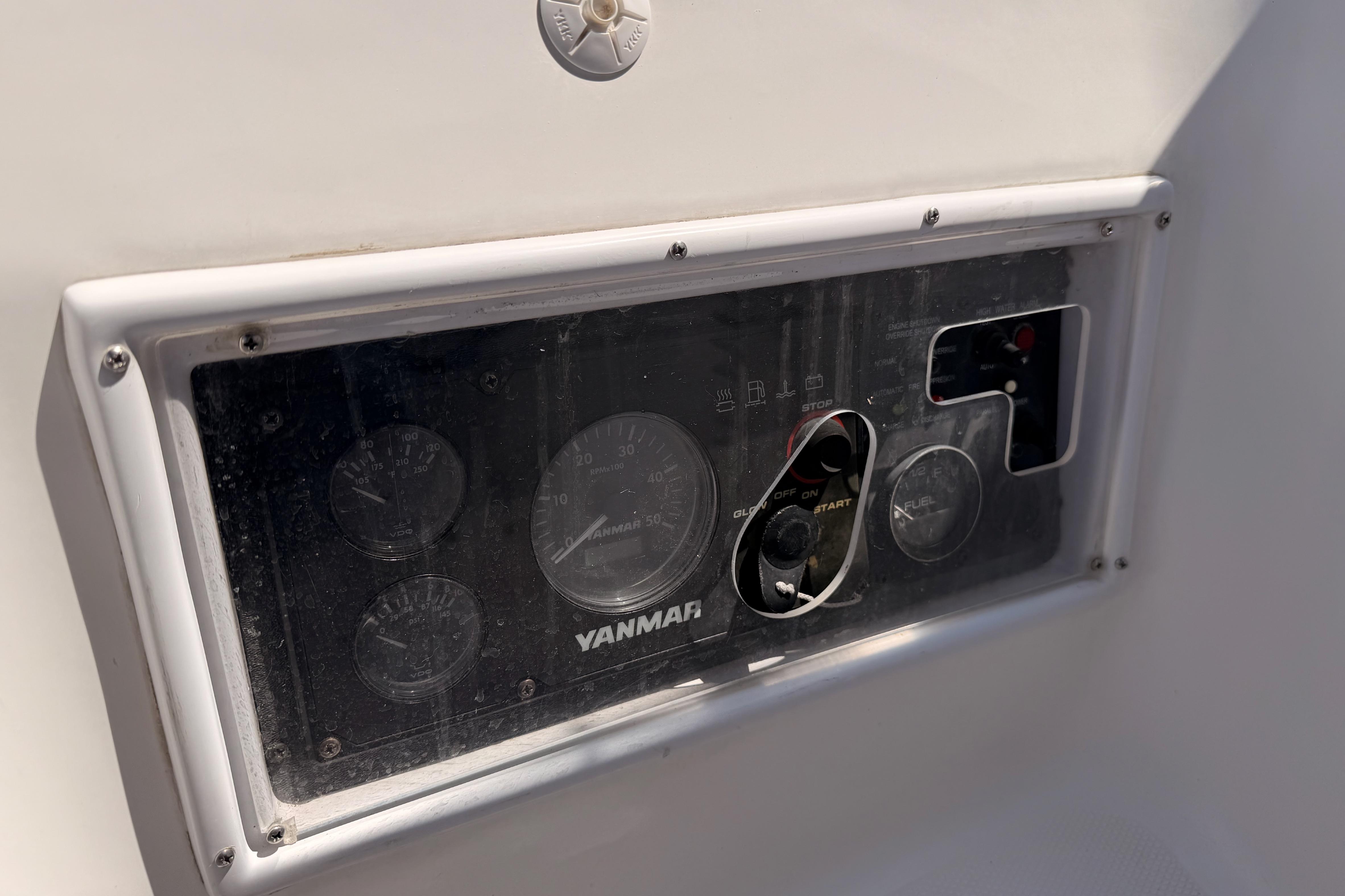 Control panel of a 2008 Hunter 45 Deck Salon sailboat with Yanmar engine gauges.