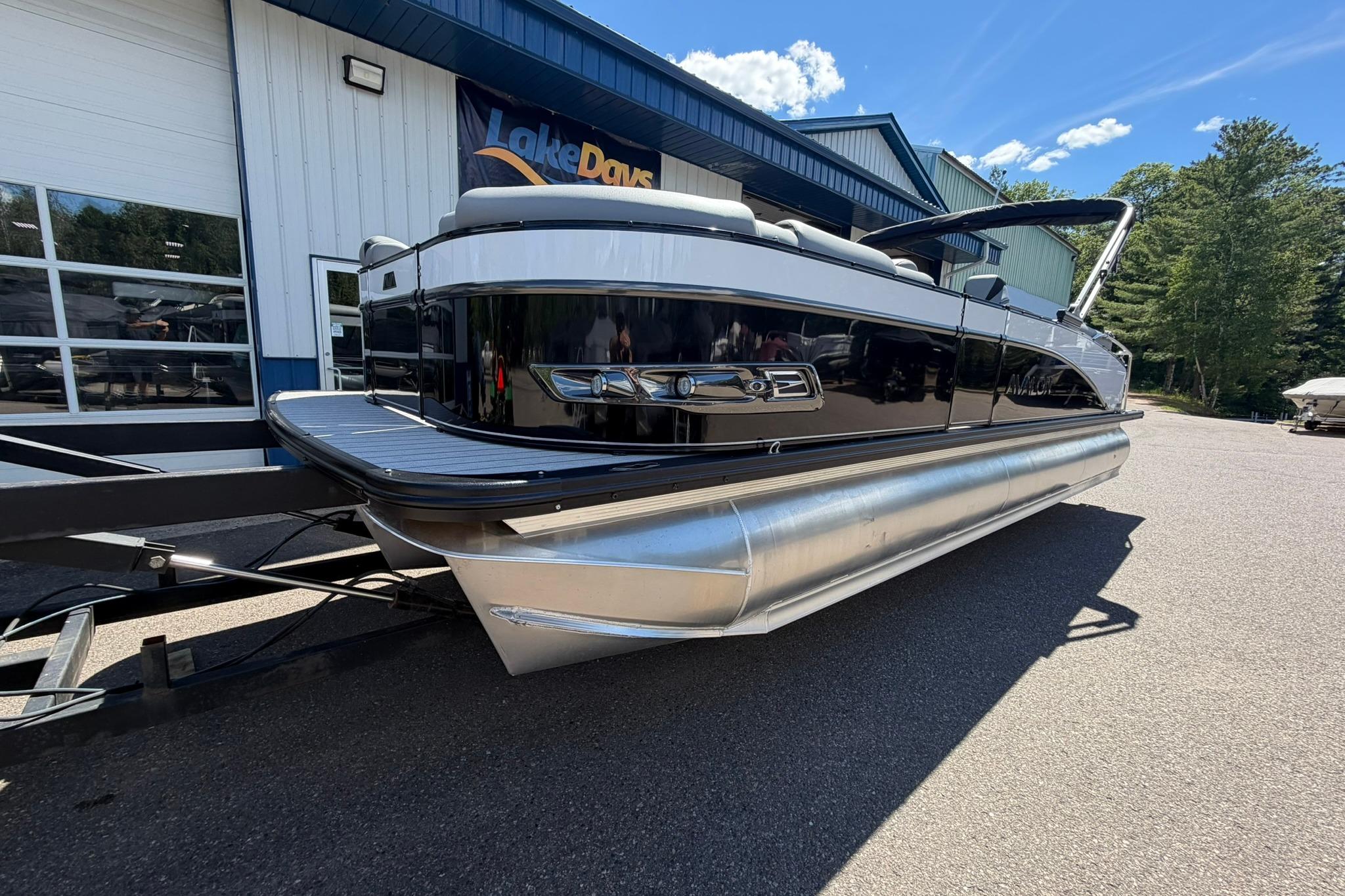 2026 Avalon Catalina Quad Lounge Shift pontoon boat at dealership.