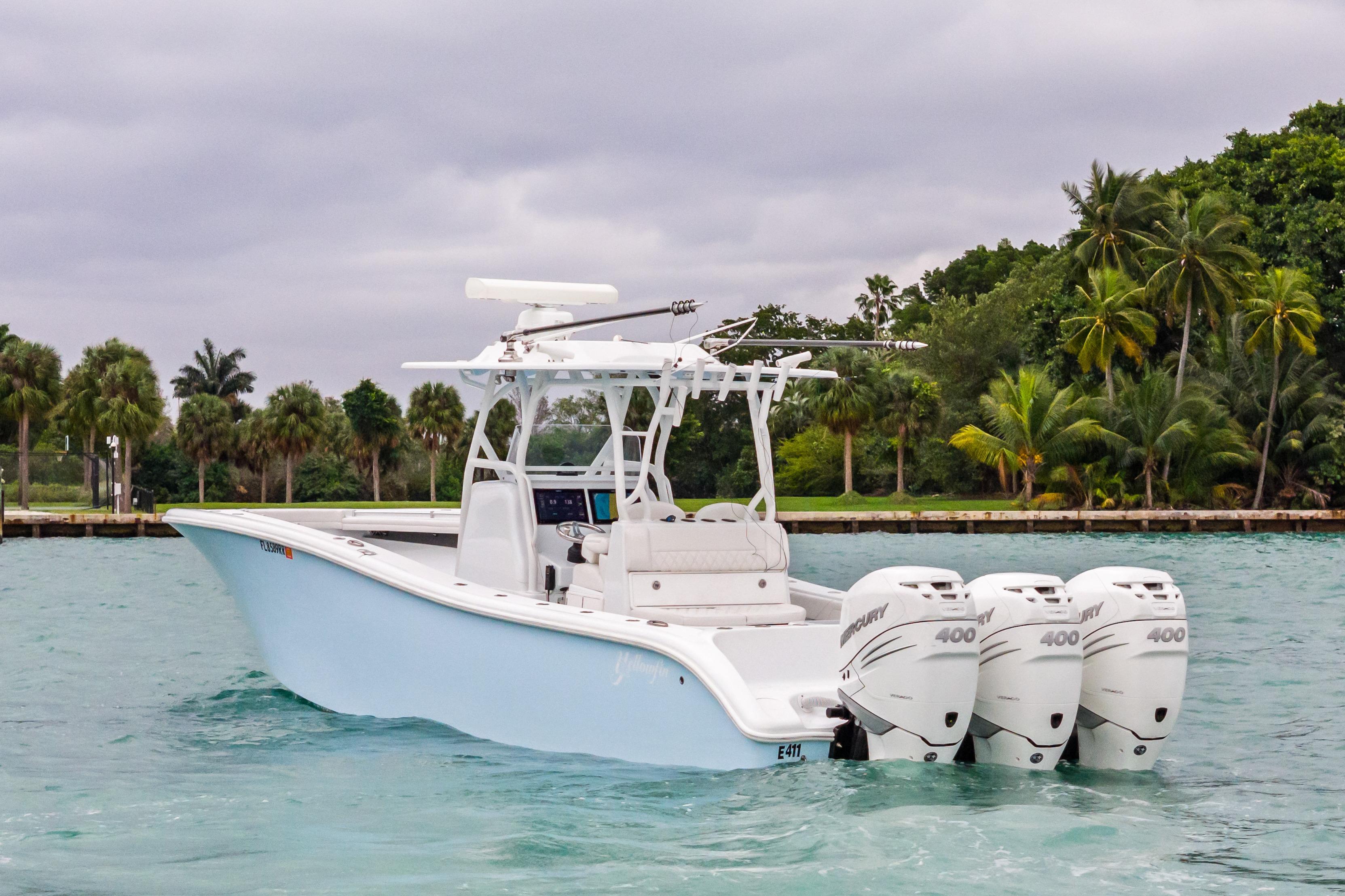2021 Yellowfin 36 Offshore boat with triple Mercury engines on tropical water.