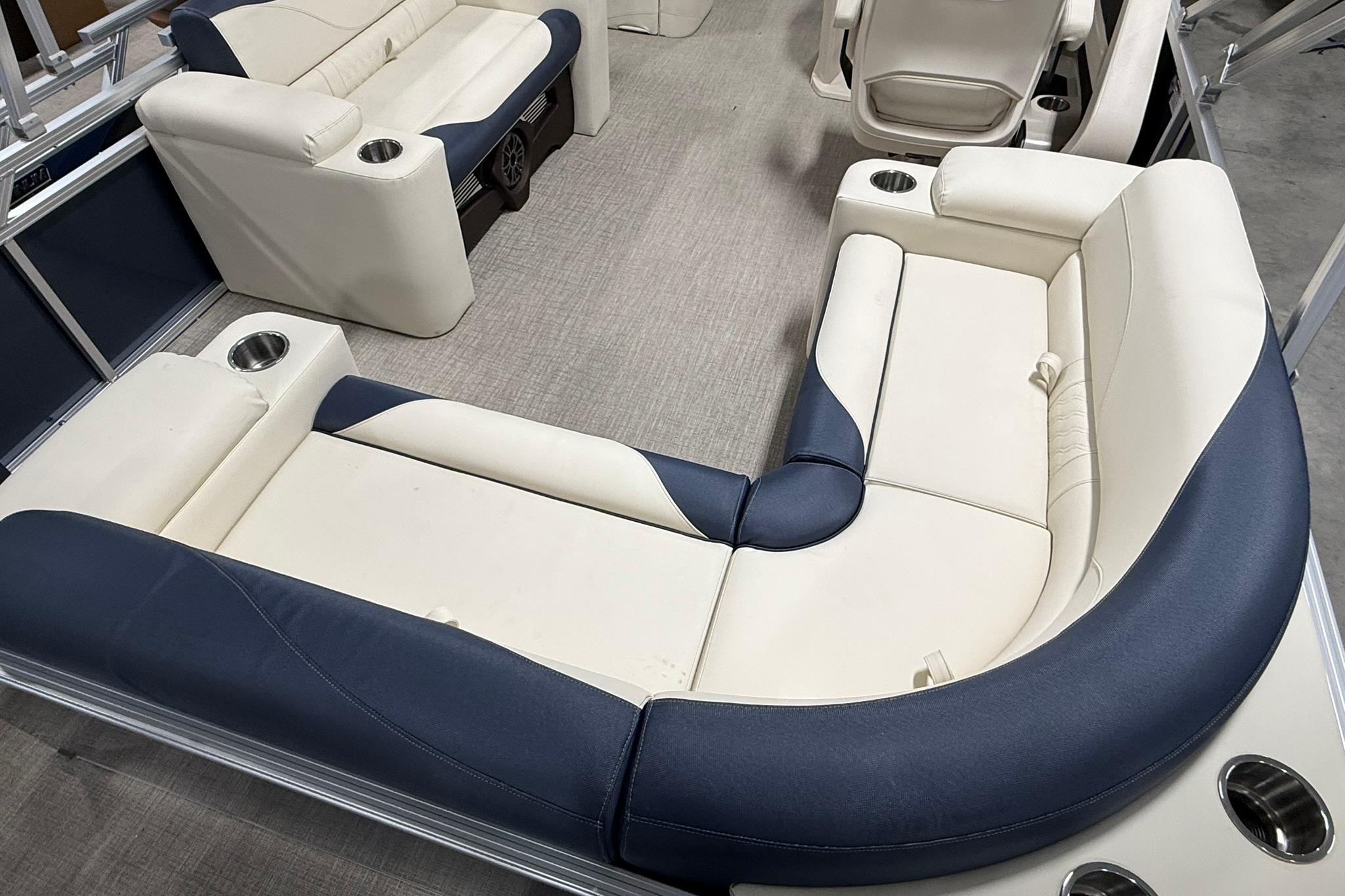 2026 Avalon LSZ Elite 21' boat interior with luxurious seating and cup holders.