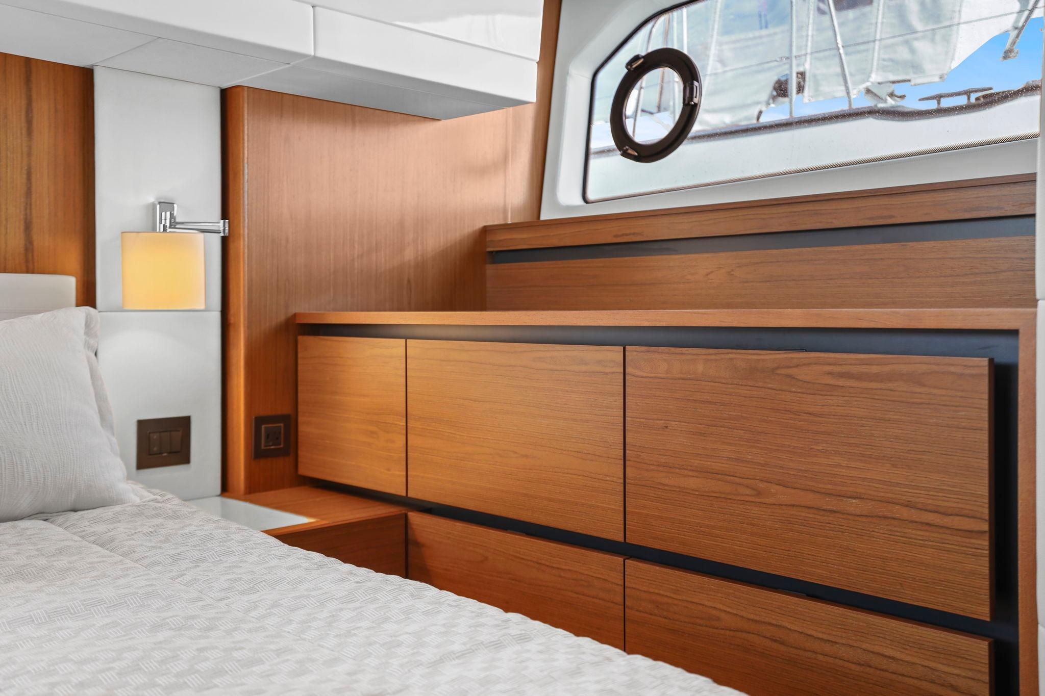 Luxurious interior of 2023 Tiara Yachts C49 Coupe with elegant wood finish and modern design.