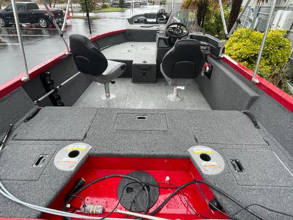 2021 Crestliner 1650 Fish Hawk SC boat interior with seating and storage compartments.