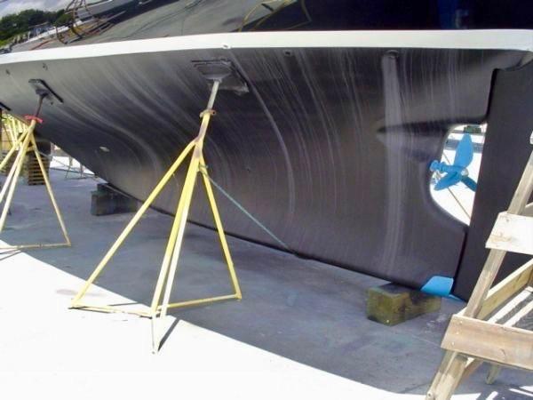 1983 Cherubini Schooner hull on stands during maintenance.