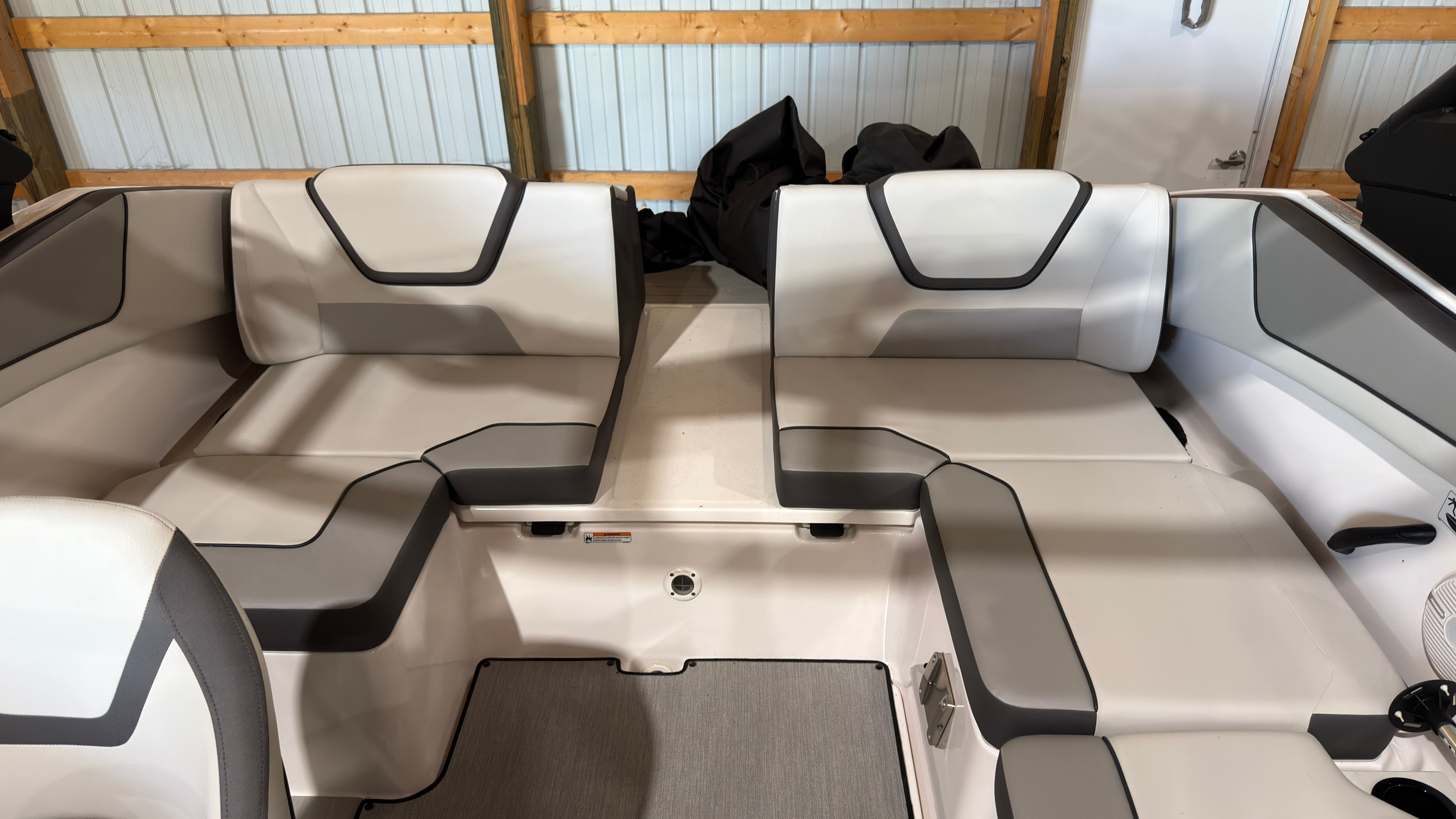 Interior of 2024 Yamaha Boats AR220 with gray seating.