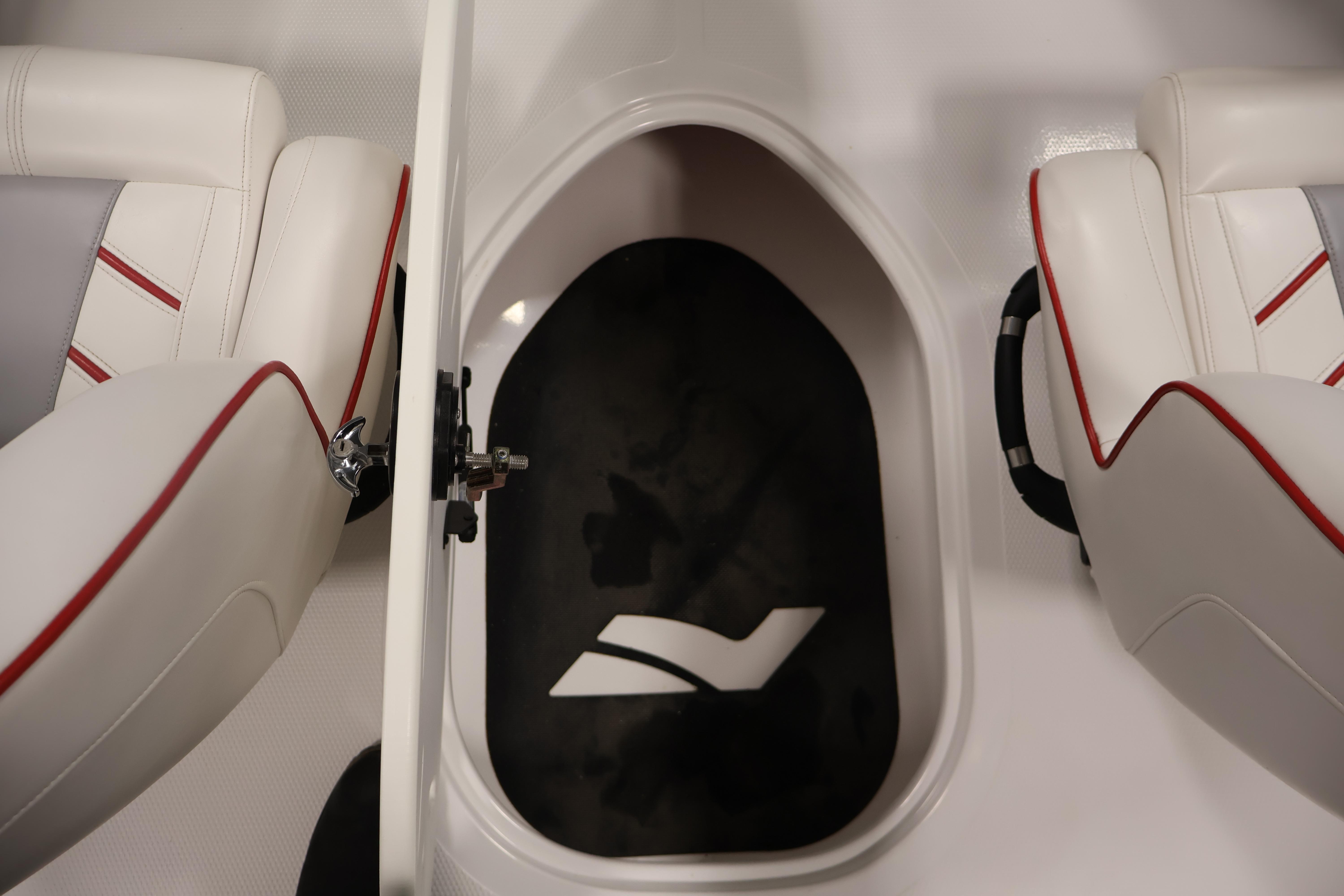 2019 Nitro Z19 Sport boat interior with white seats and red accents.