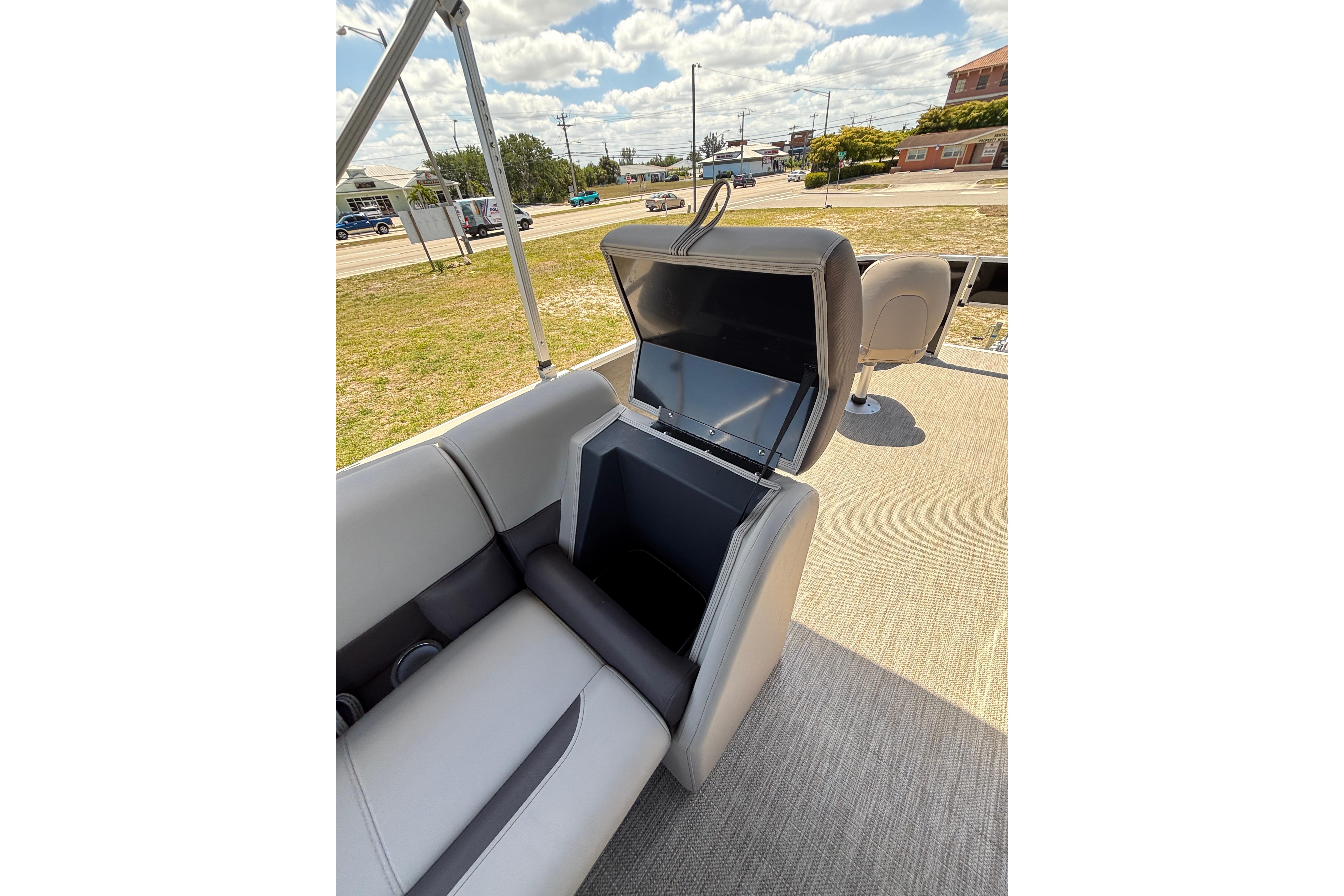 2026 Bentley Pontoons Fish 243 4-Point seat with storage compartment.