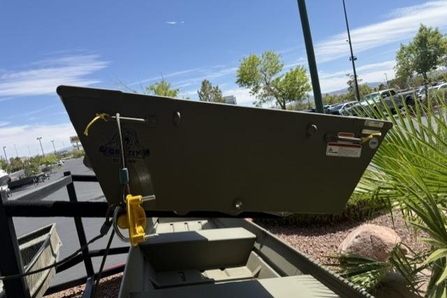 2026 Tracker Grizzly 10 Jon boat displayed outdoors, showcasing its sturdy design.