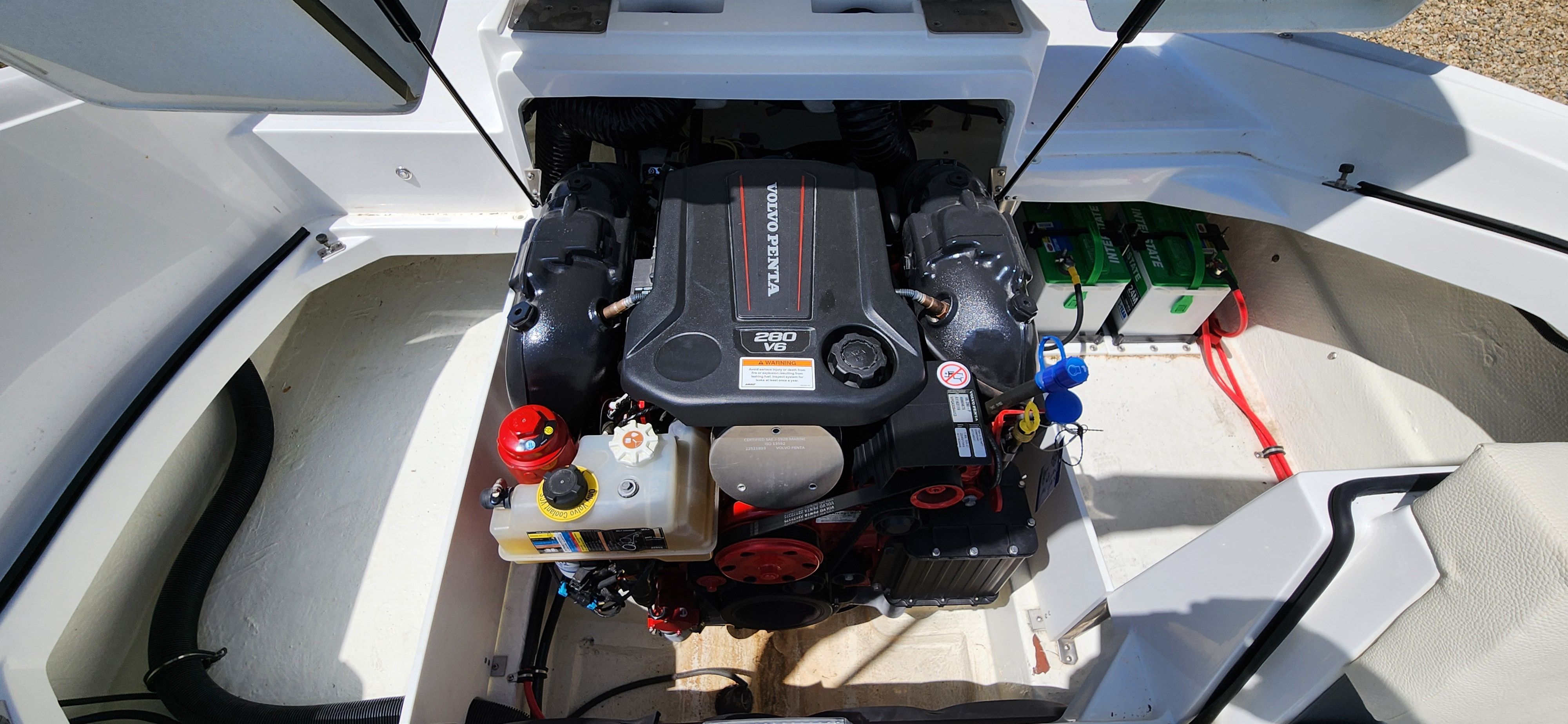 Engine compartment of a Cobalt CS22 boat with a Volvo Penta engine.