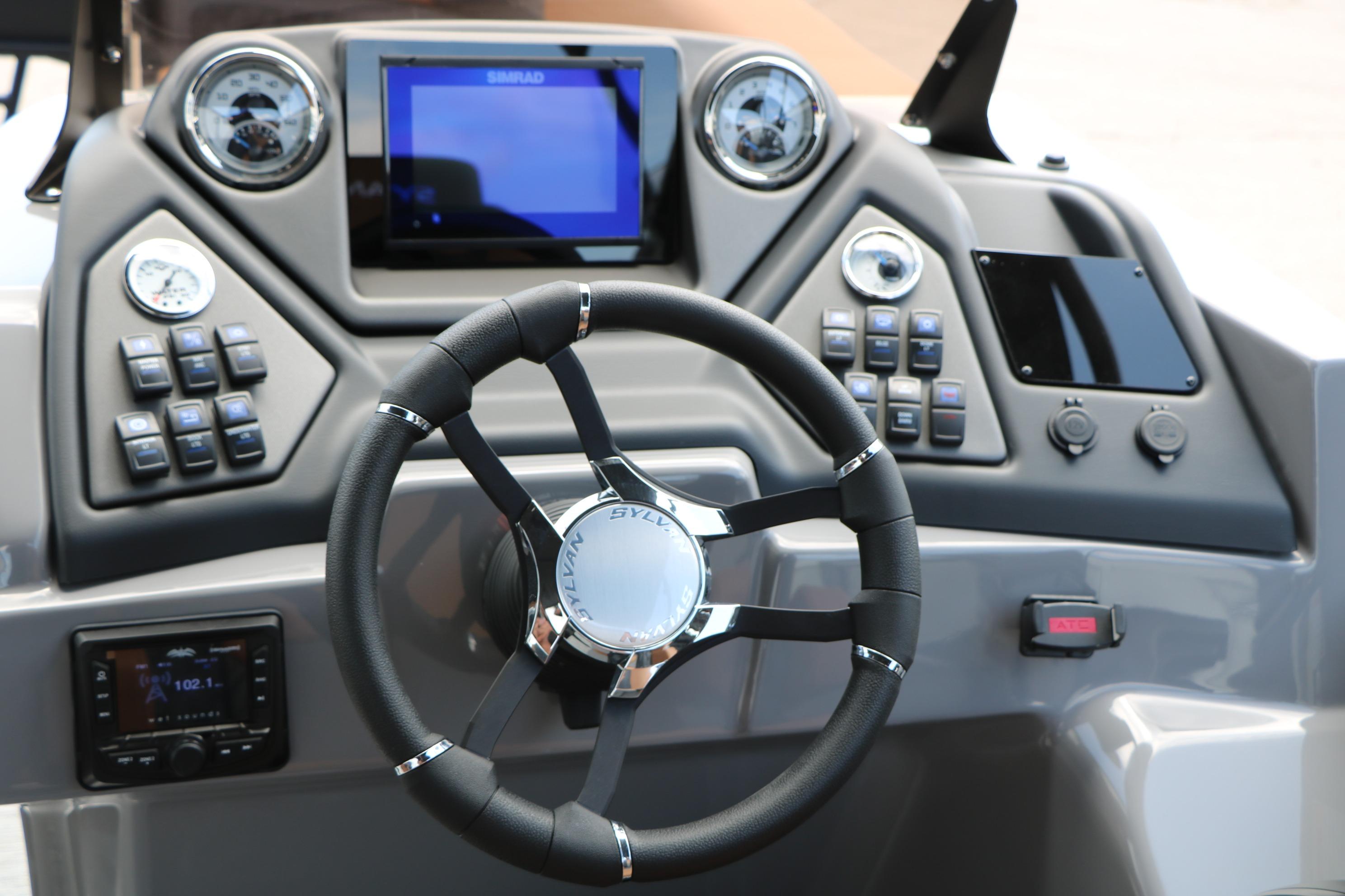 Steering console of 2026 Sylvan L3 DLZ Bar Platinum Edition Tri-Toon boat.