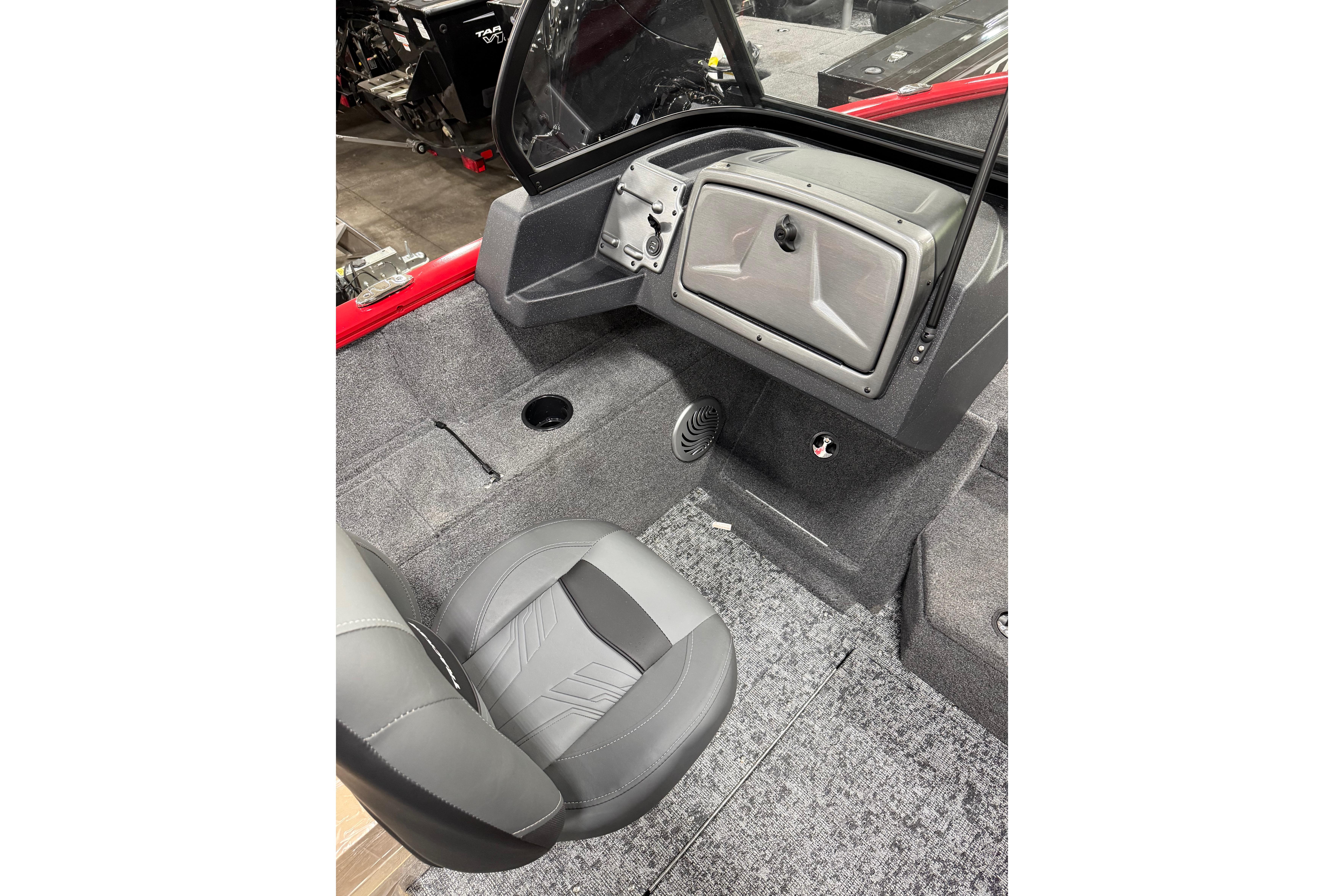 Interior of 2026 Tracker Pro Guide V-175 Combo boat with gray seating and dashboard.