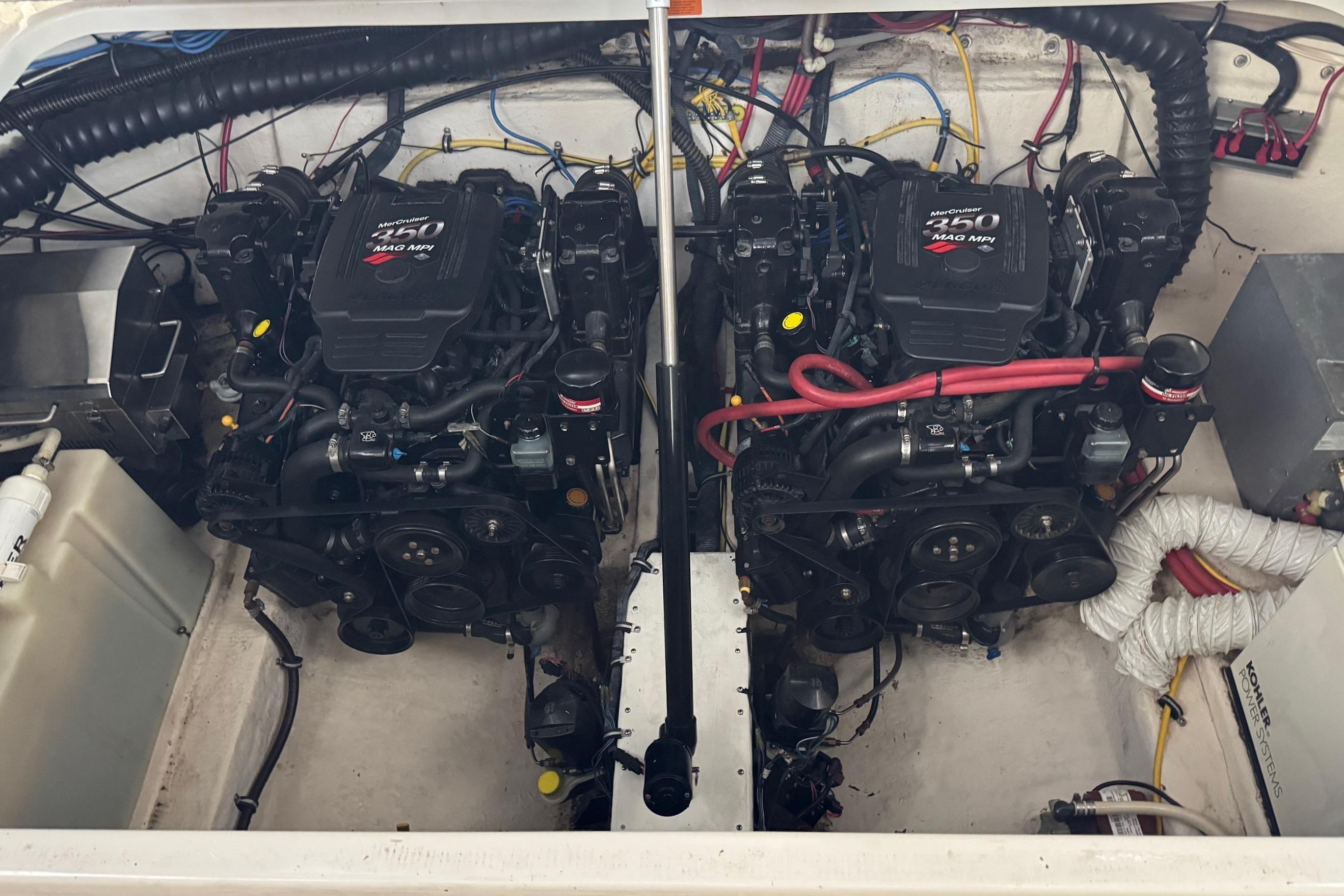 Engine compartment of a 2006 Chaparral 330 Signature with twin MerCruiser 350 MAG MPI engines.