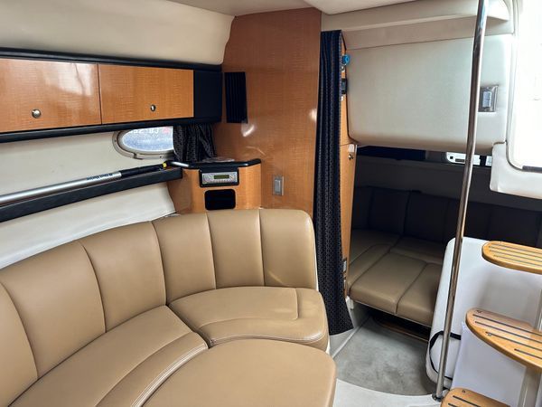Interior of 2006 Chaparral Signature 310 yacht with leather seating.