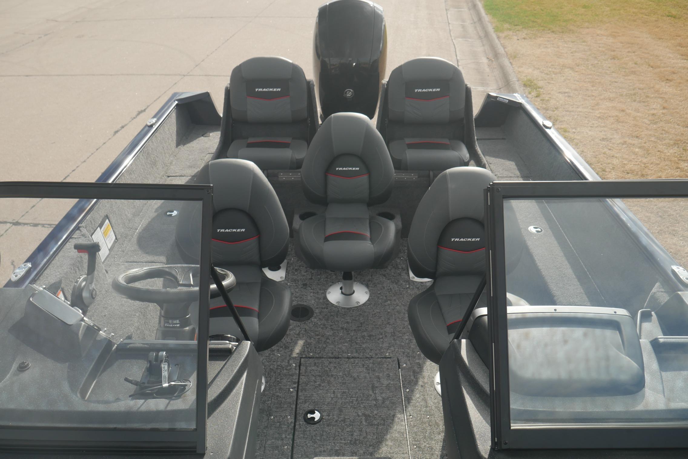 2026 Tracker Pro Guide V-175 Combo boat interior with seating and steering console.