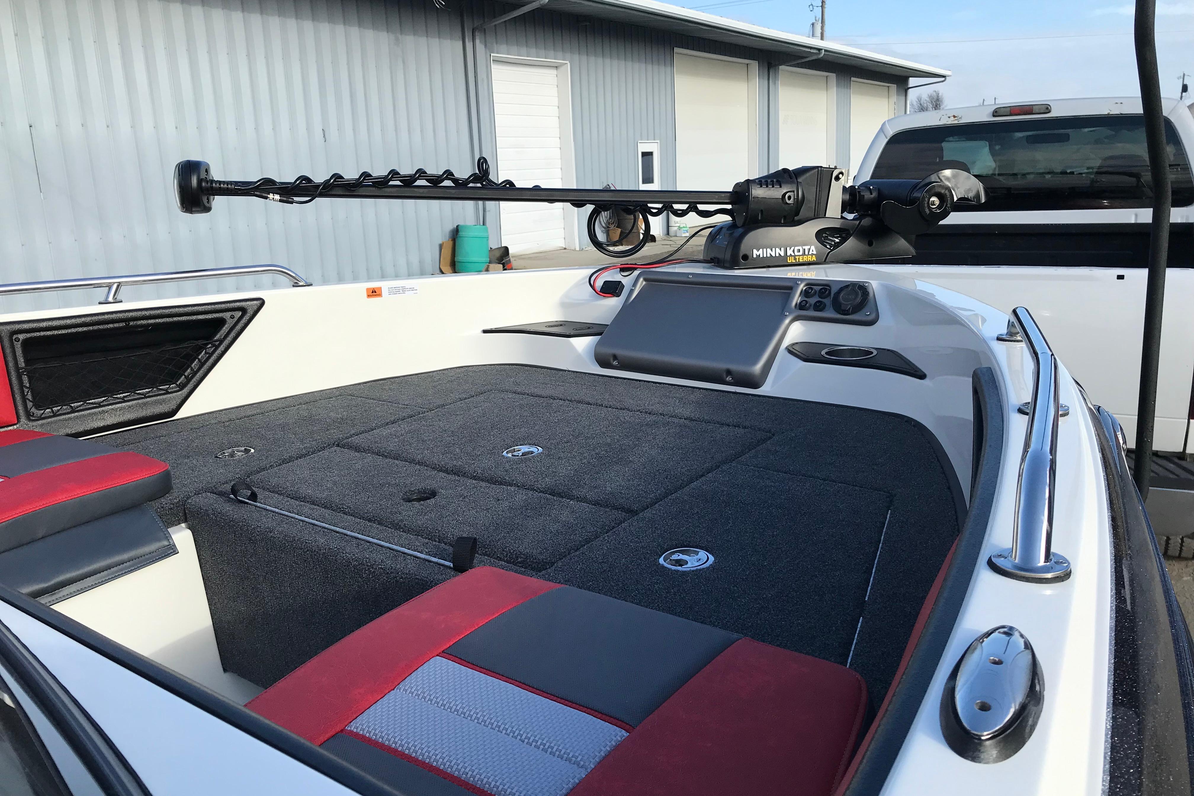 2026 Ranger 1850MS boat interior with Minn Kota trolling motor, parked near a building.