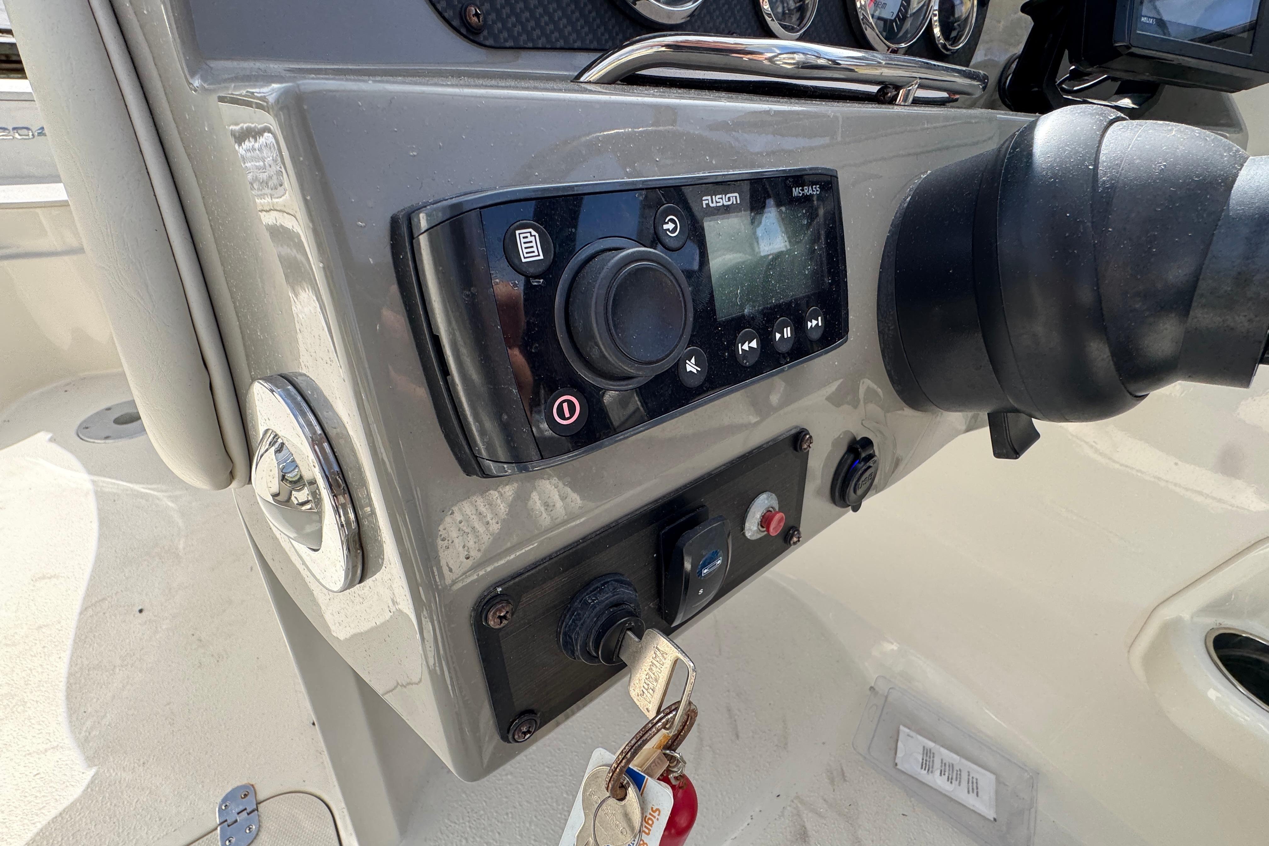 Control panel of a 2019 Stingray 204 LR boat with Fusion audio system.