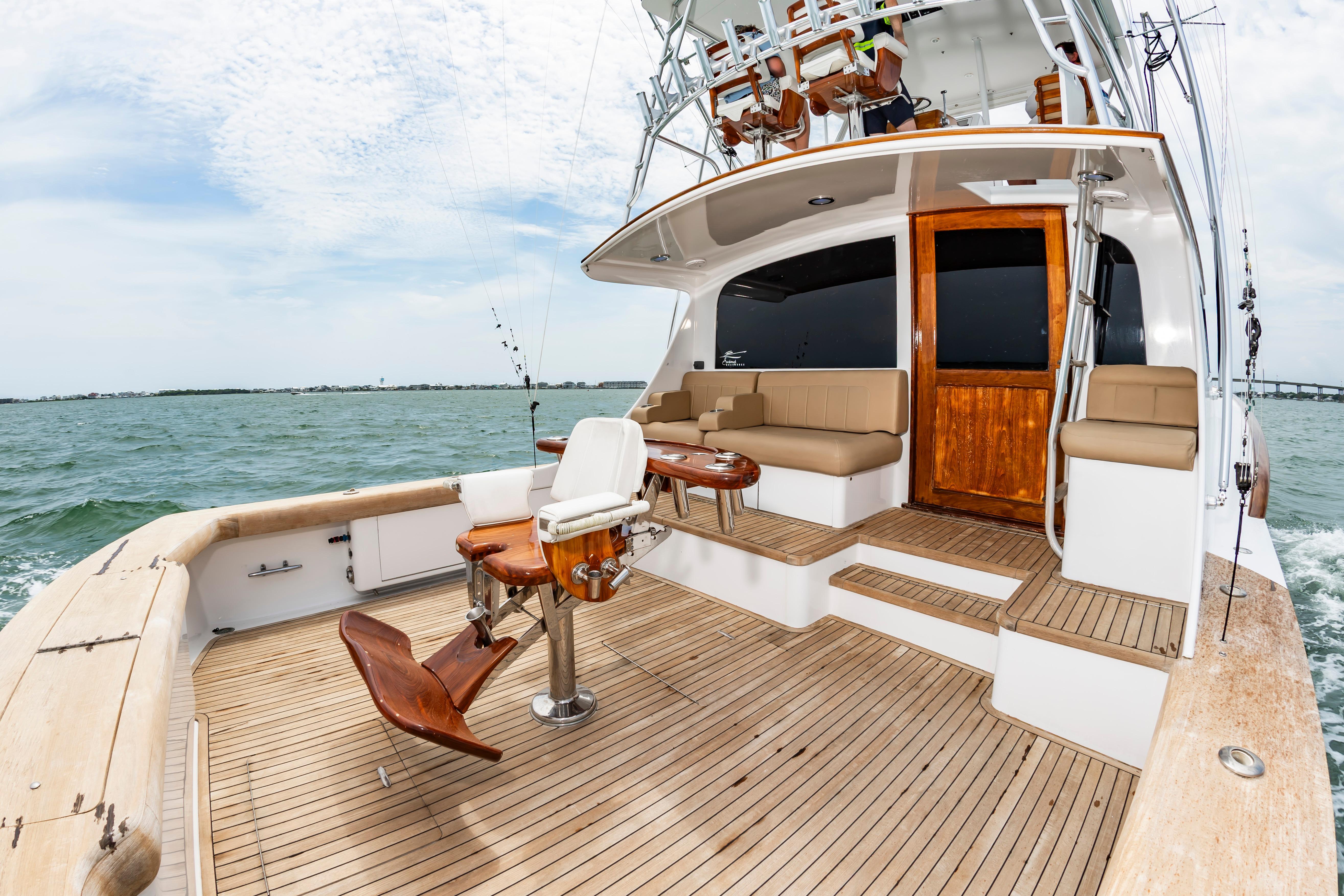 Custom Carolina Scarborough 56 Convertible yacht, 1993 model, with spacious deck and seating area.