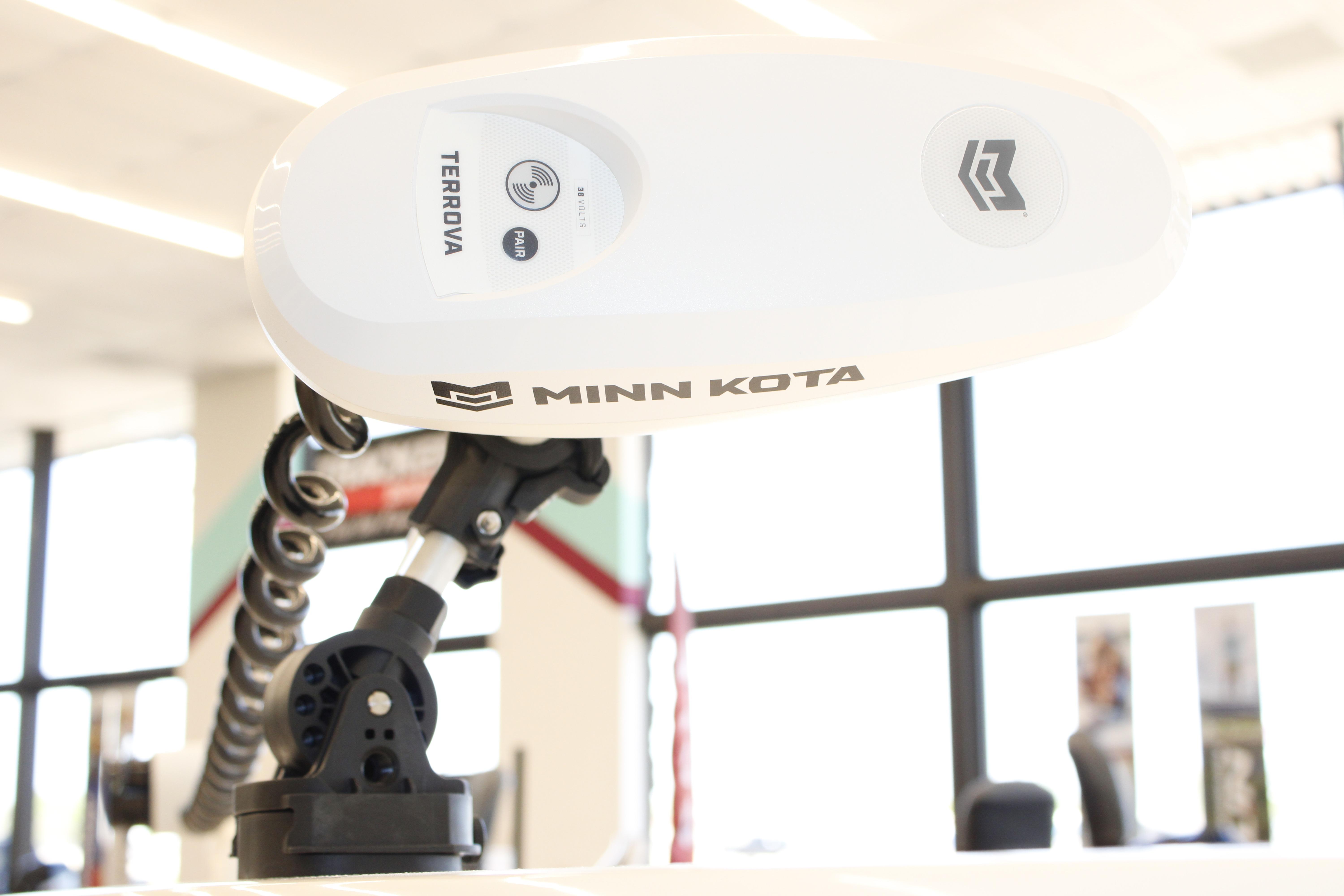 Minn Kota Terrova trolling motor on Mako 24 APEX, 2026 model, in a showroom setting.