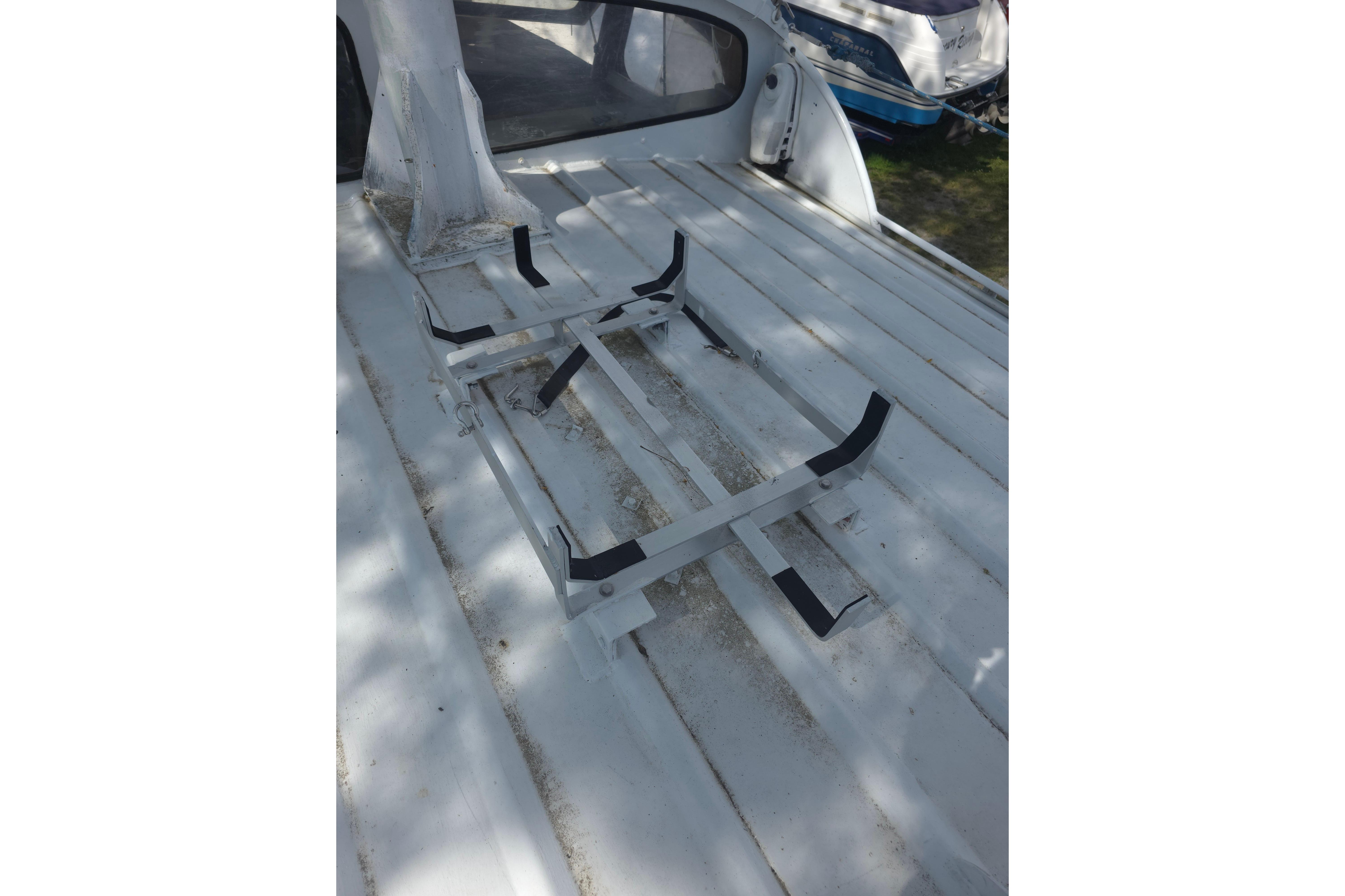 1974 Breaux's Bay Craft Passenger boat deck with metal frame structure.
