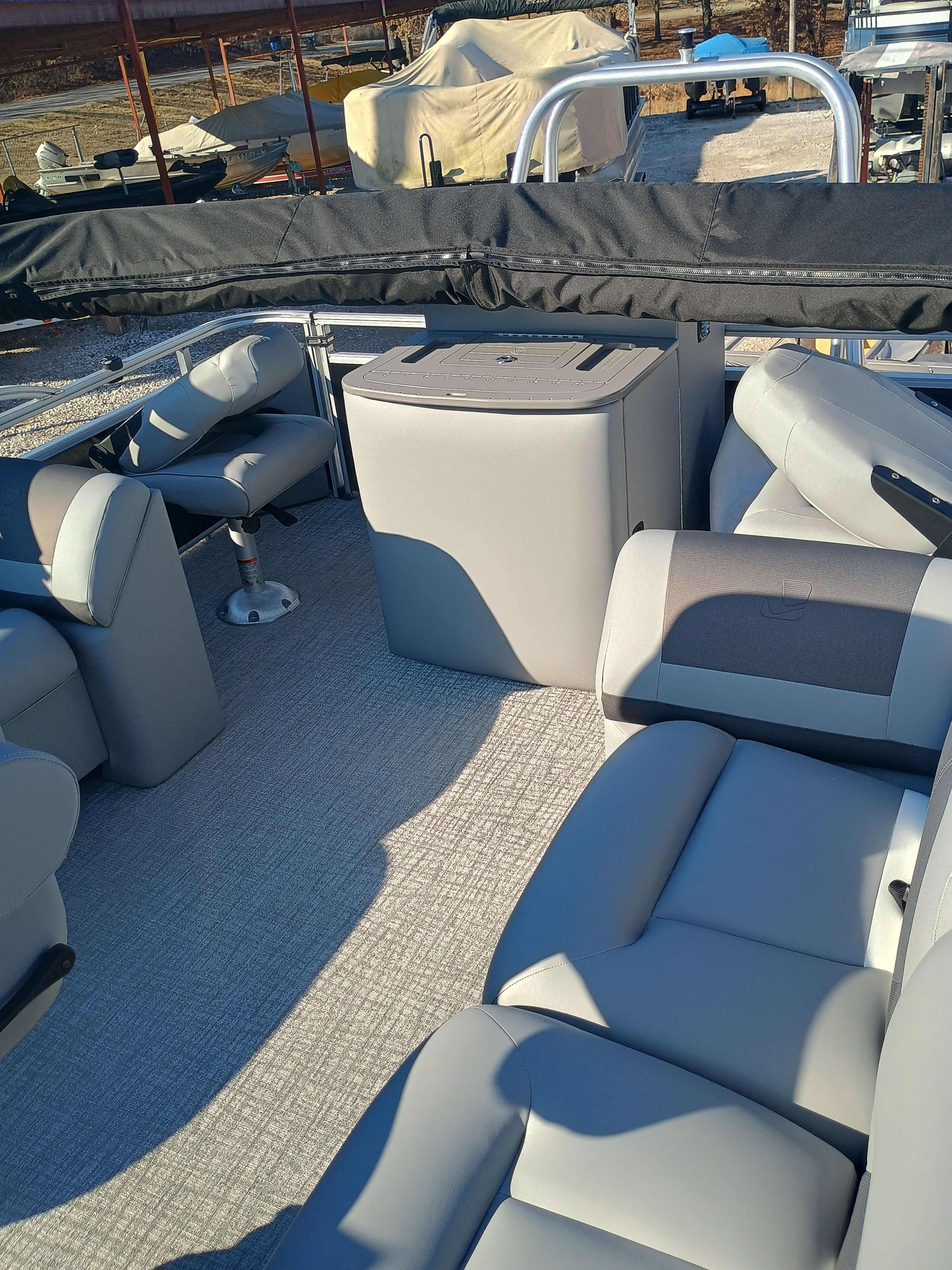 Interior of 2026 Landau Alure 25CC Fish-Black with gray seating.