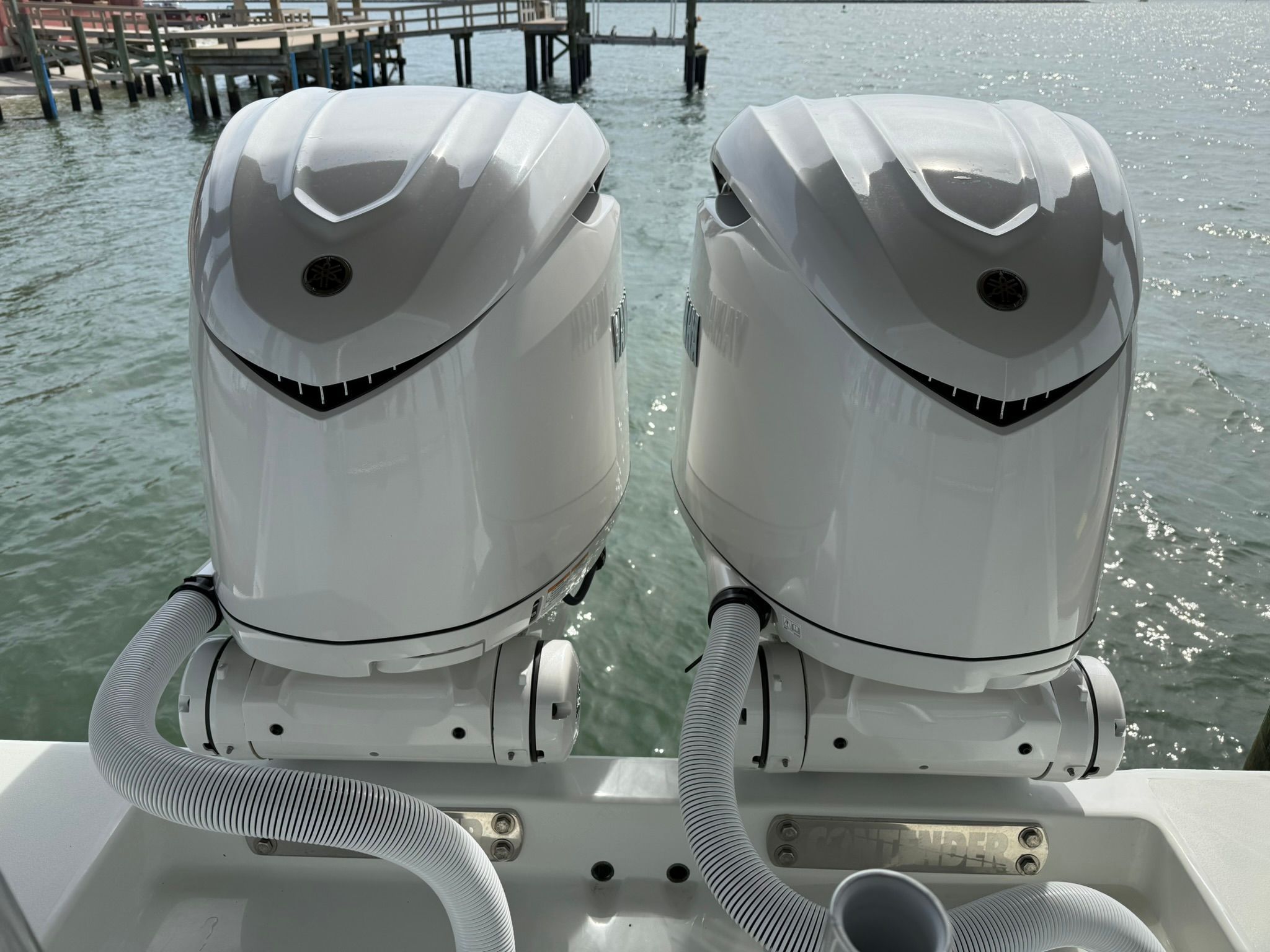 Two outboard motors on a 2025 Contender 32 ST boat.